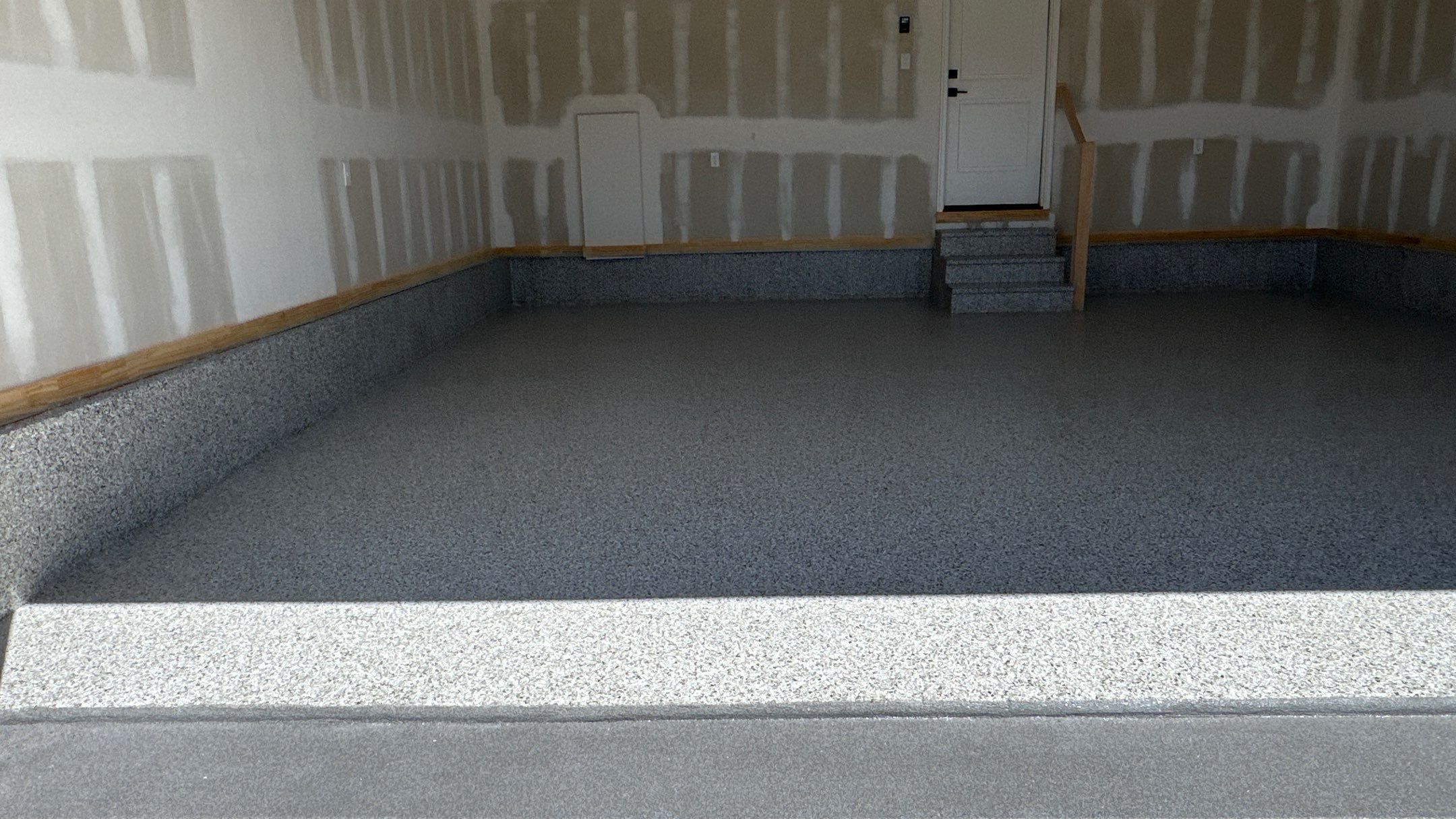 Phil B. new floor with Coyote flake by Banner Garage