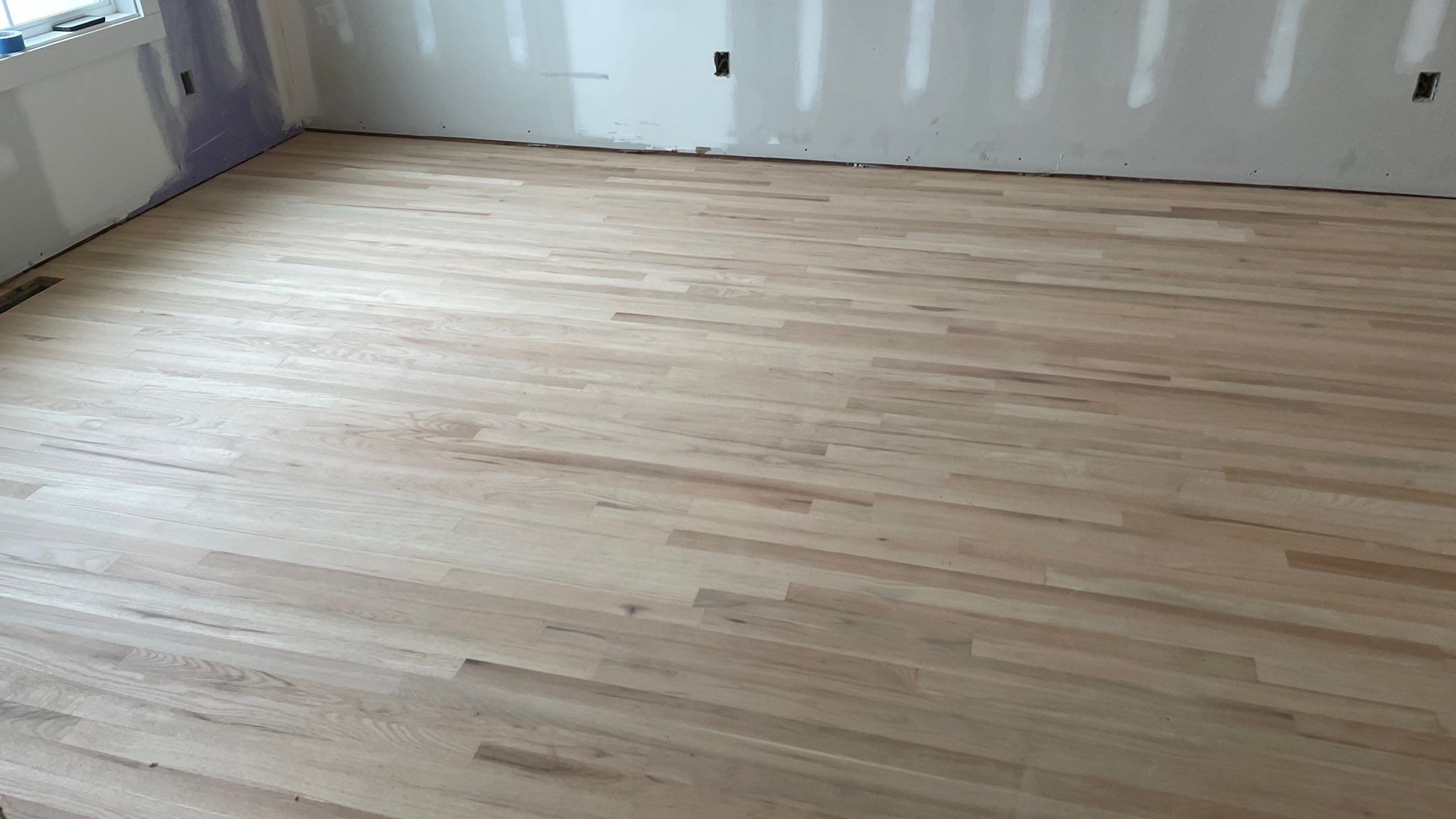 Remodeled Home with new tile floors, Showers and Refinished Oak Floors with stain and Waterbased Finish by Footprints Floors of Coastal Carolina