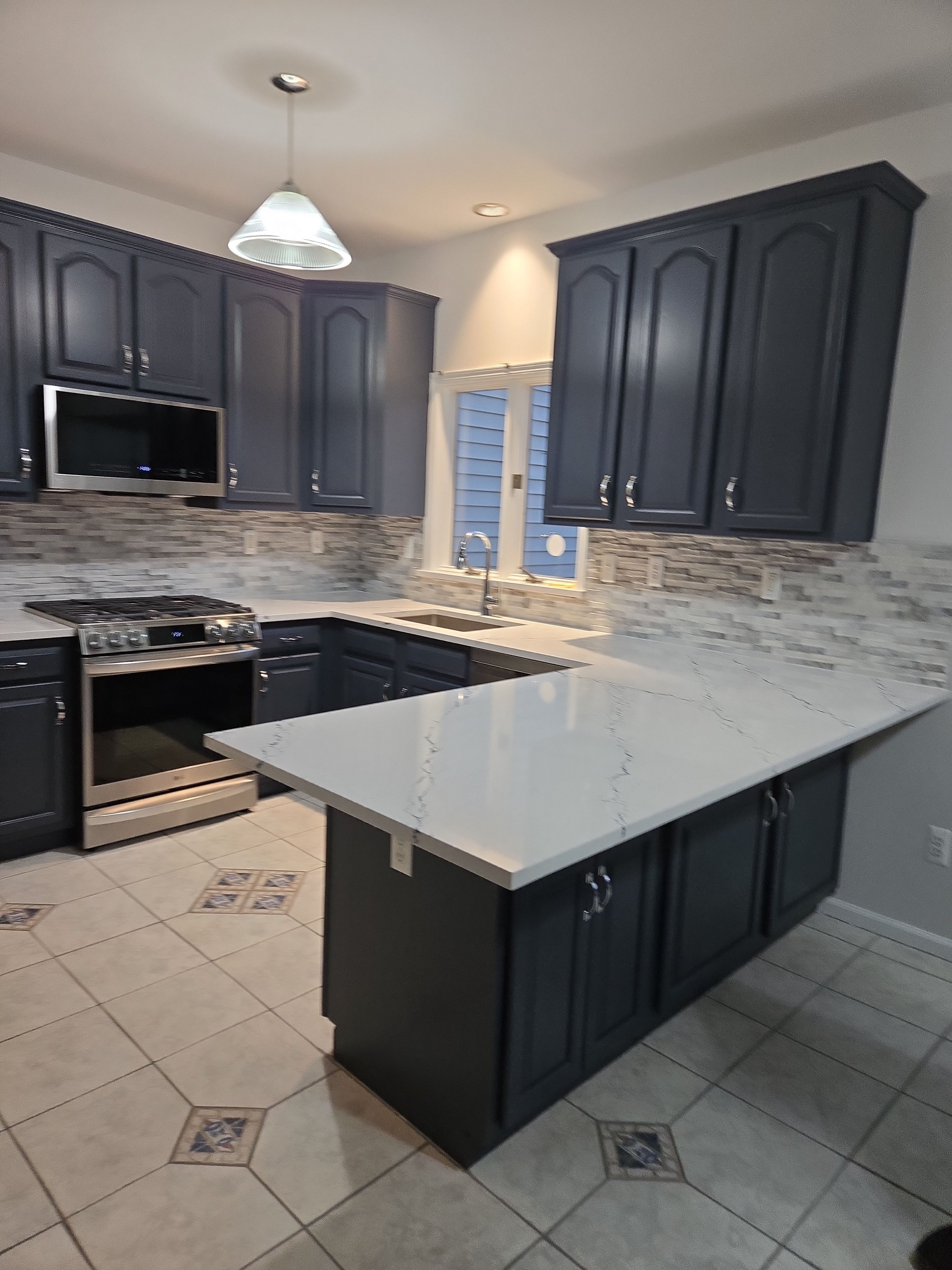 Cabinet Refinishing using Benjamin Moore Command by Spectrum Painting, LLC
