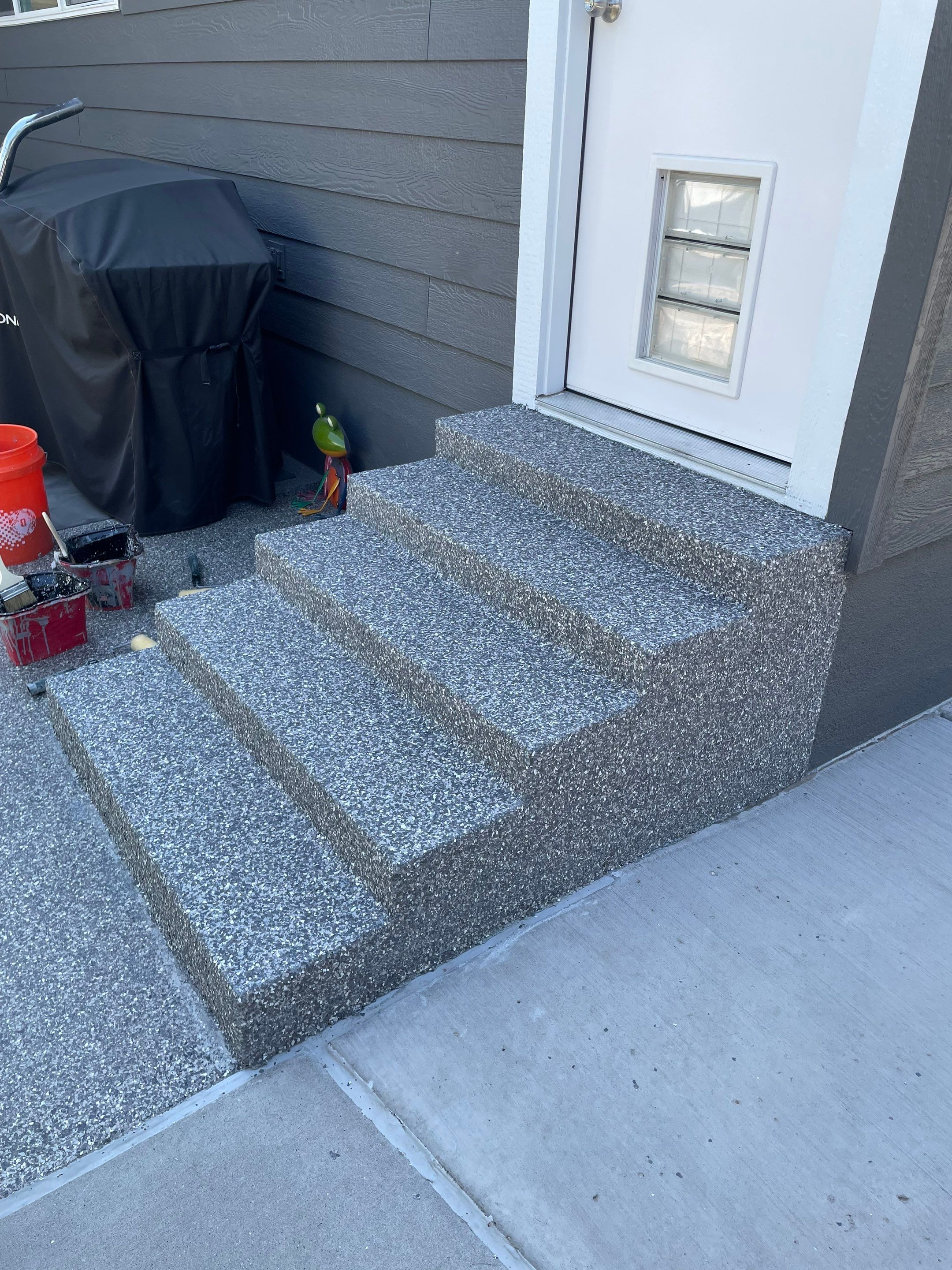 Silver Creek Flak Coating for Patio and Entry Steps in Sioux Falls by Select Painting, Coatings & Garage Cabinets