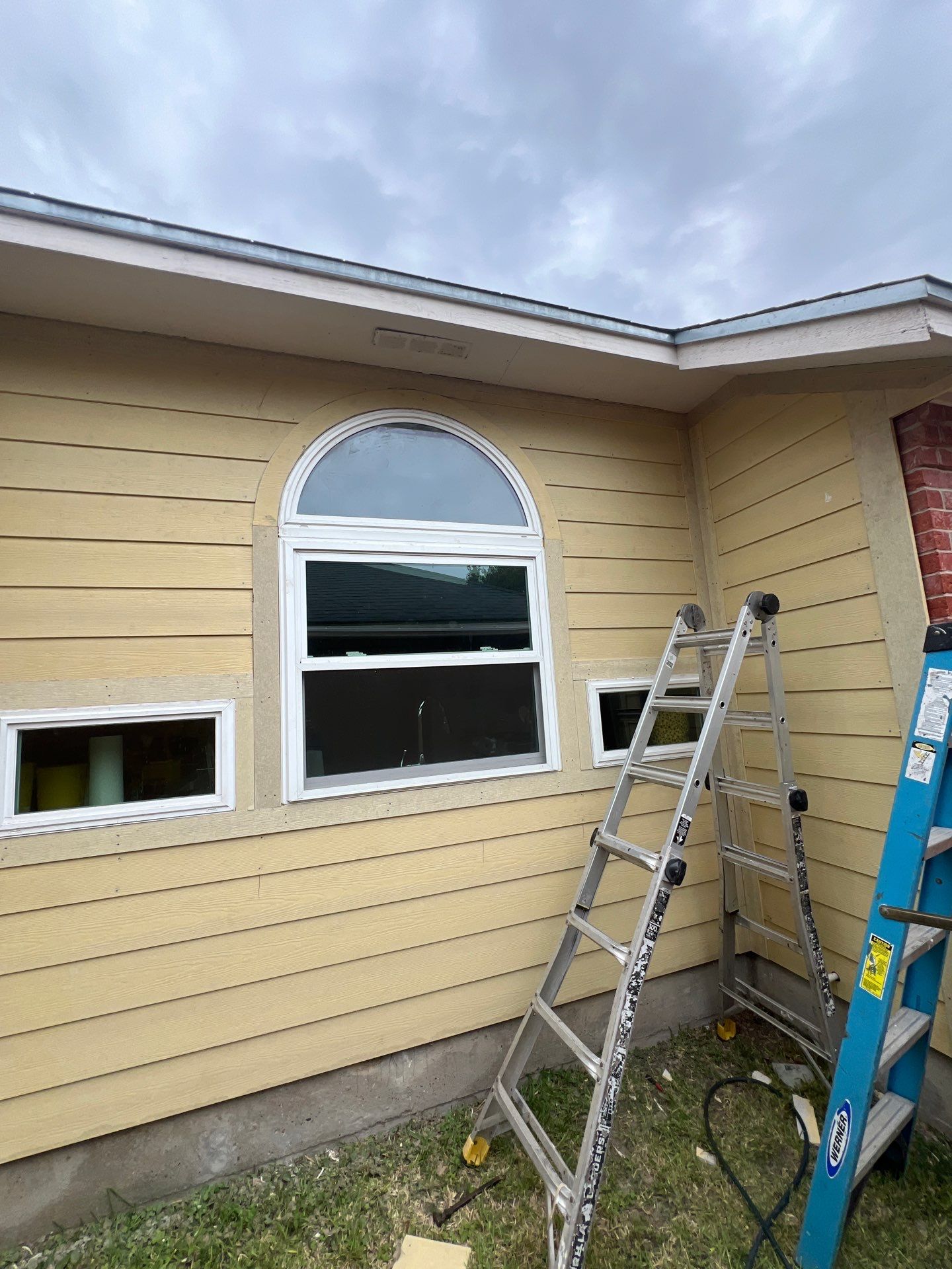 Windows with a side of Siding by Bayfront Roofing and Construction