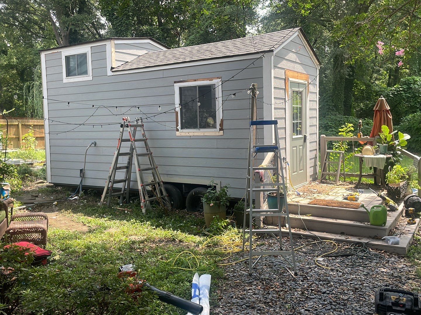 tiny home remodel- siding,paint,roofing by Nailed It Roofing & Remodeling LLC