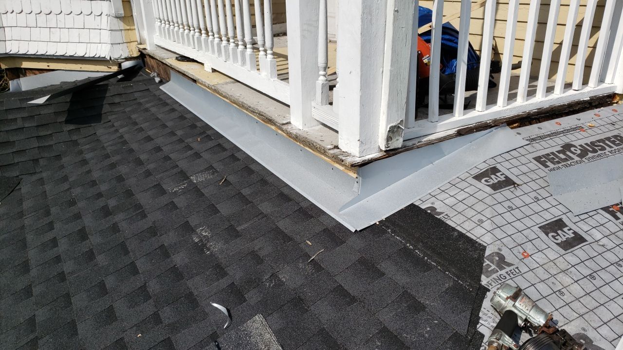 Residential Roofing Installation using Roof Replacement by American Roofing & Construction LLC