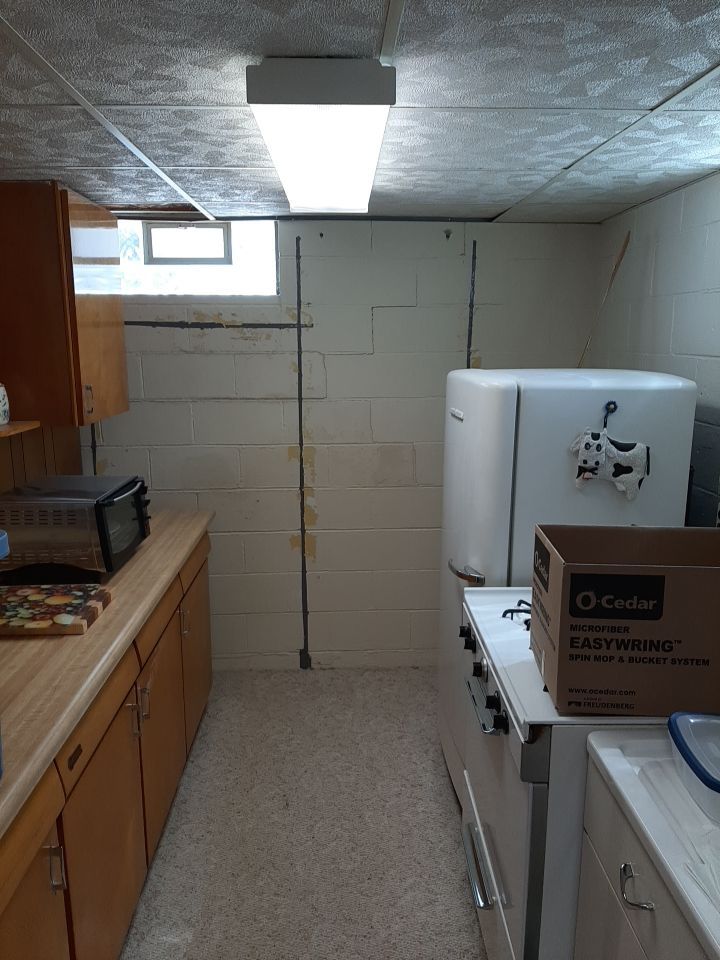 Wall Straightening and Reinforcement using Embedded Fiber Reinforcement by Toledo Basement Repair 