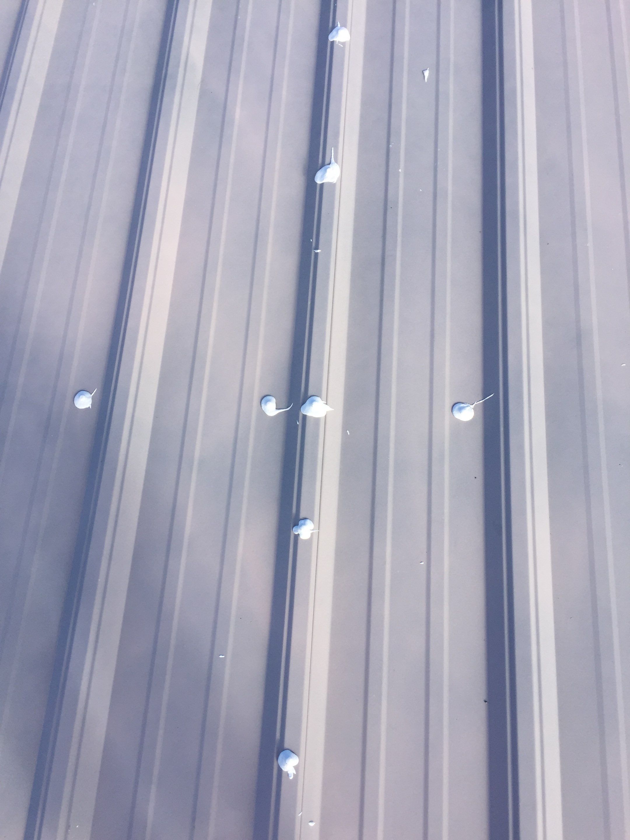 Commercial Roof Coating using Gaco Silicone Roof Coating by Secure Construction Company Inc