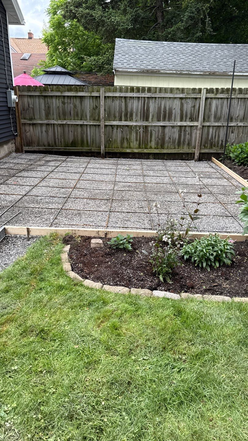 Oxford slate stamped patio and walkway  by NG Masonry & Construction LLC