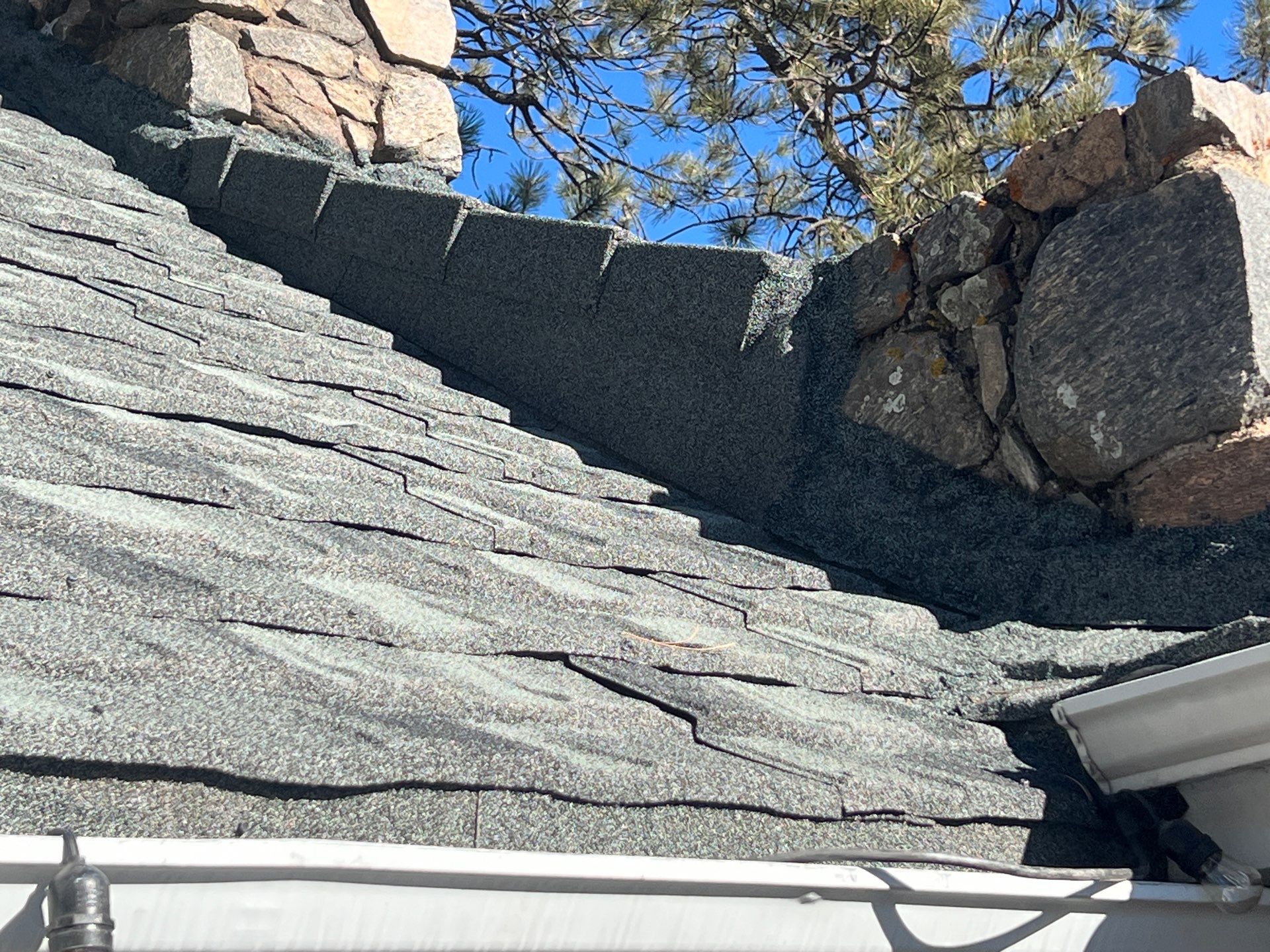 Residential Roofing Installation using Stone Coated Steel by Blue Peaks Roofing LLC 