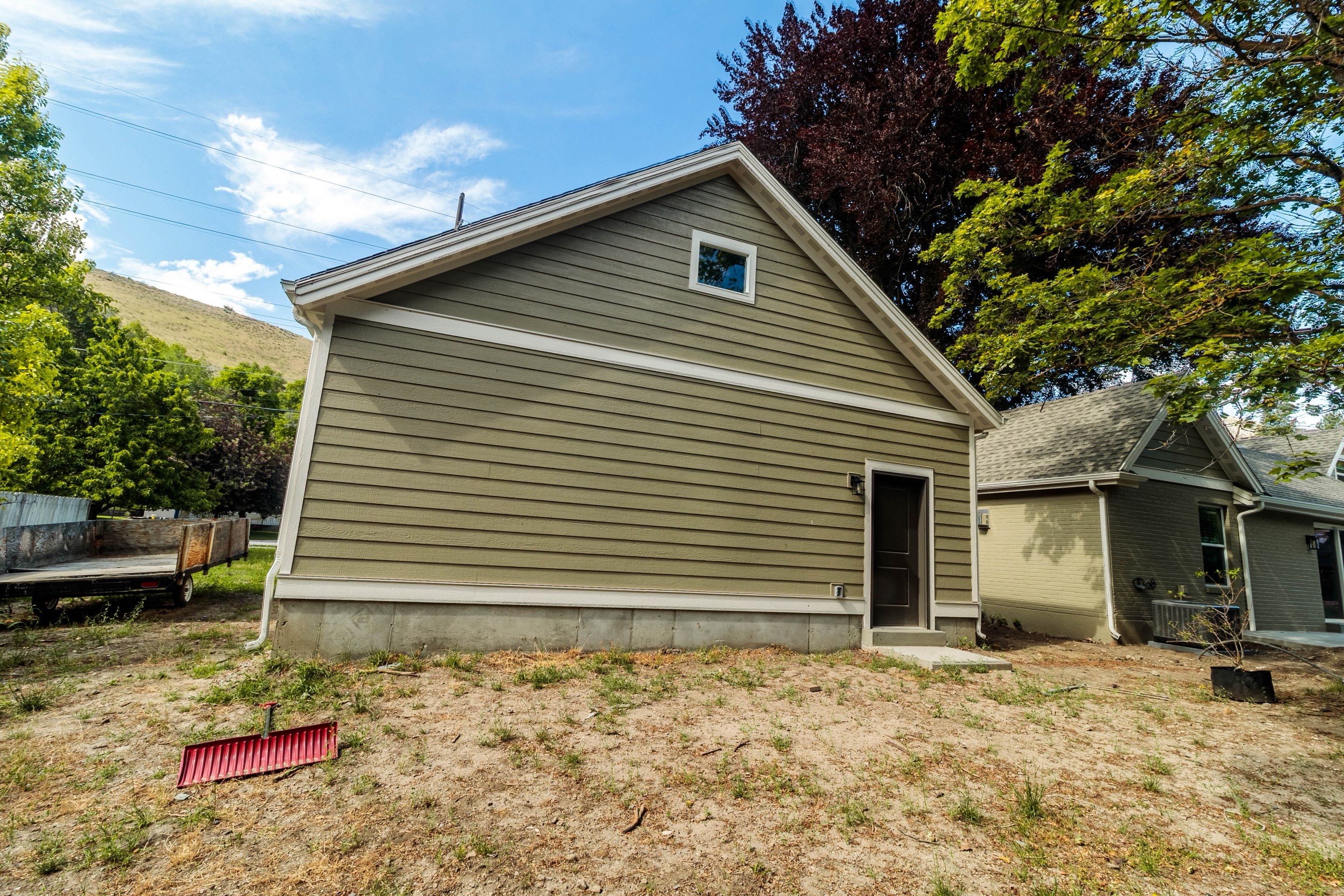 Henderson - Exterior re-cover by Garner Construction