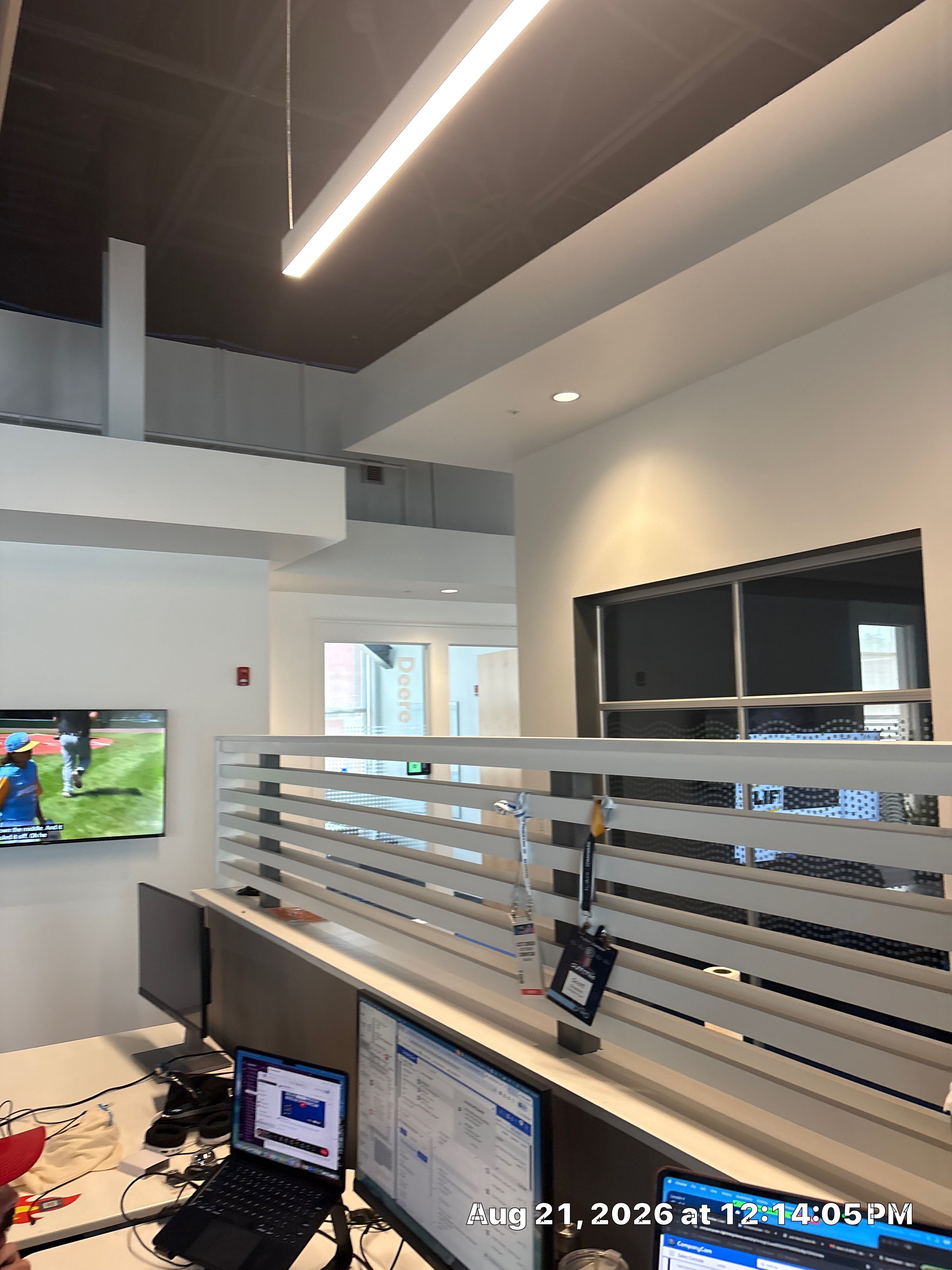 Lincoln Corporate Office Build-Out with Slatted Partitions and Acoustic Baffles by CompanyCam Sales Demo