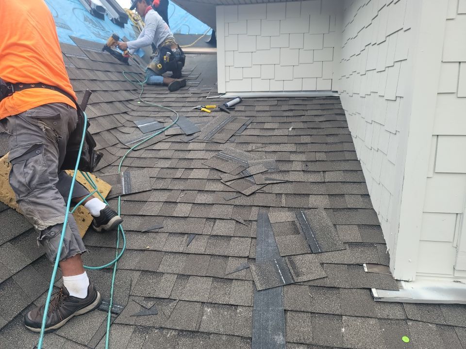 Residential Roofing Installation using Roof Replacement by American Roofing & Construction LLC