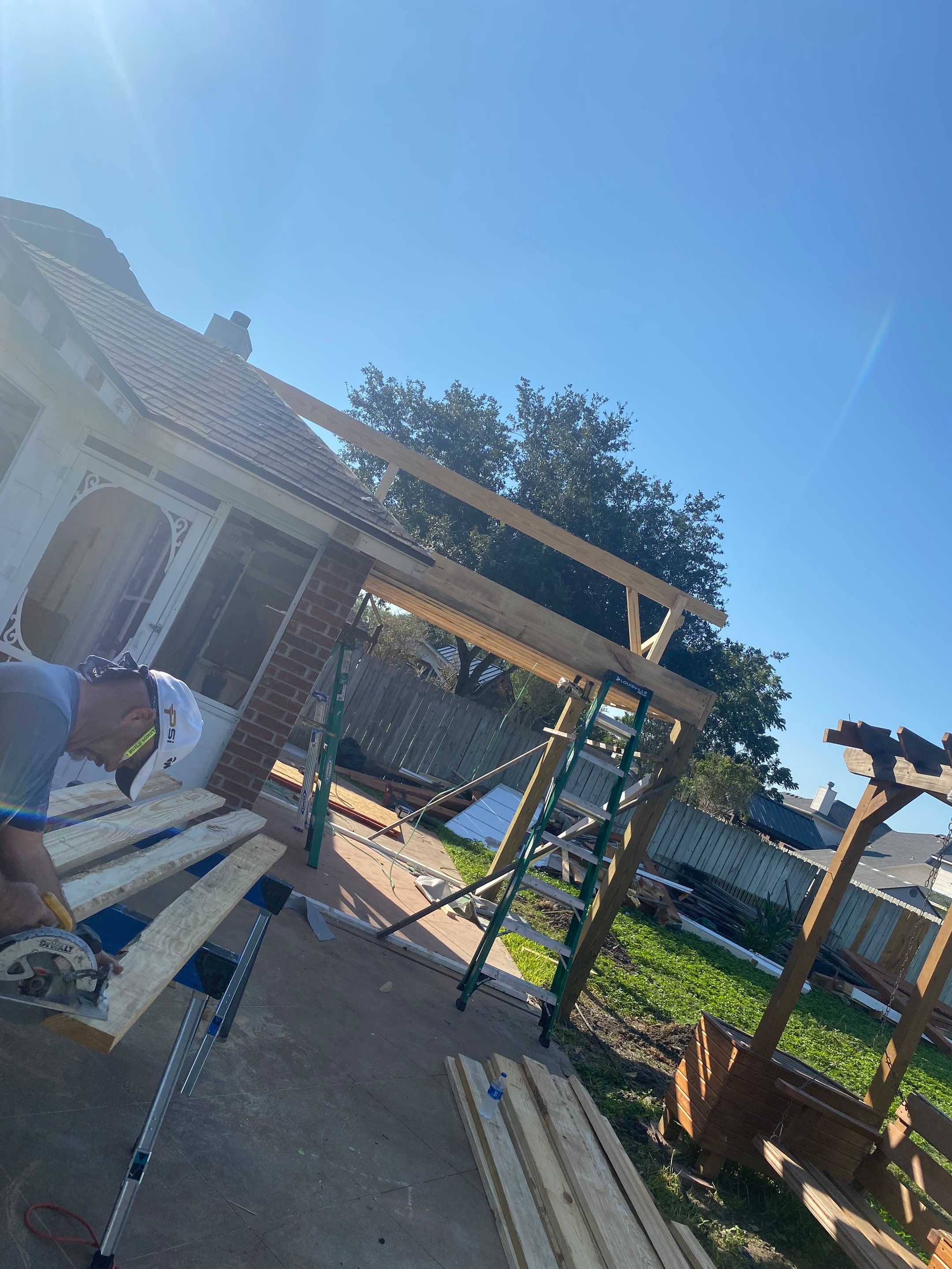 Back Yard Shade by Bayfront Roofing and Construction