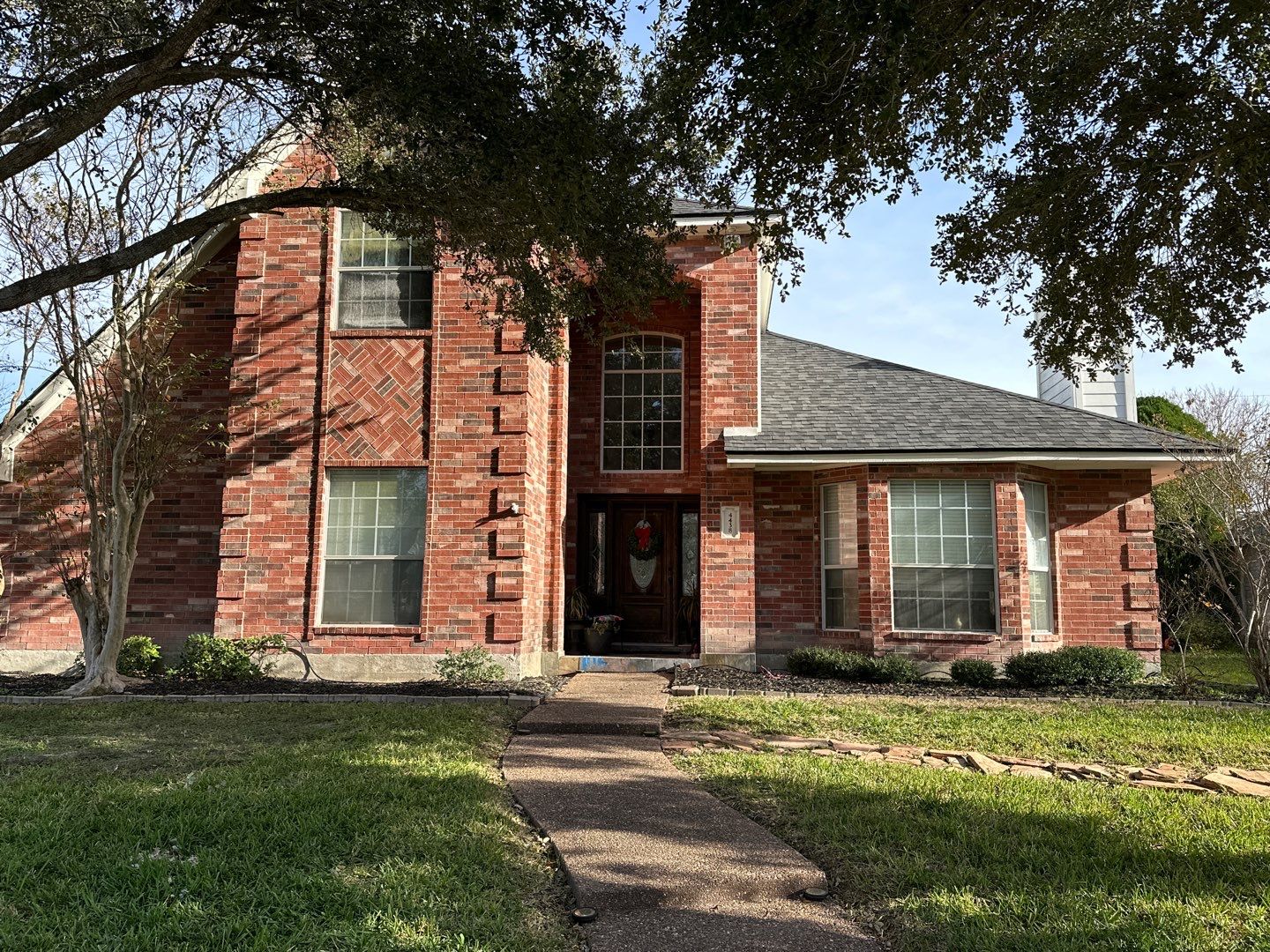 Residential Roofing Installation using Certainteed Landmark Moire Black by Galvan Roofing and Construction