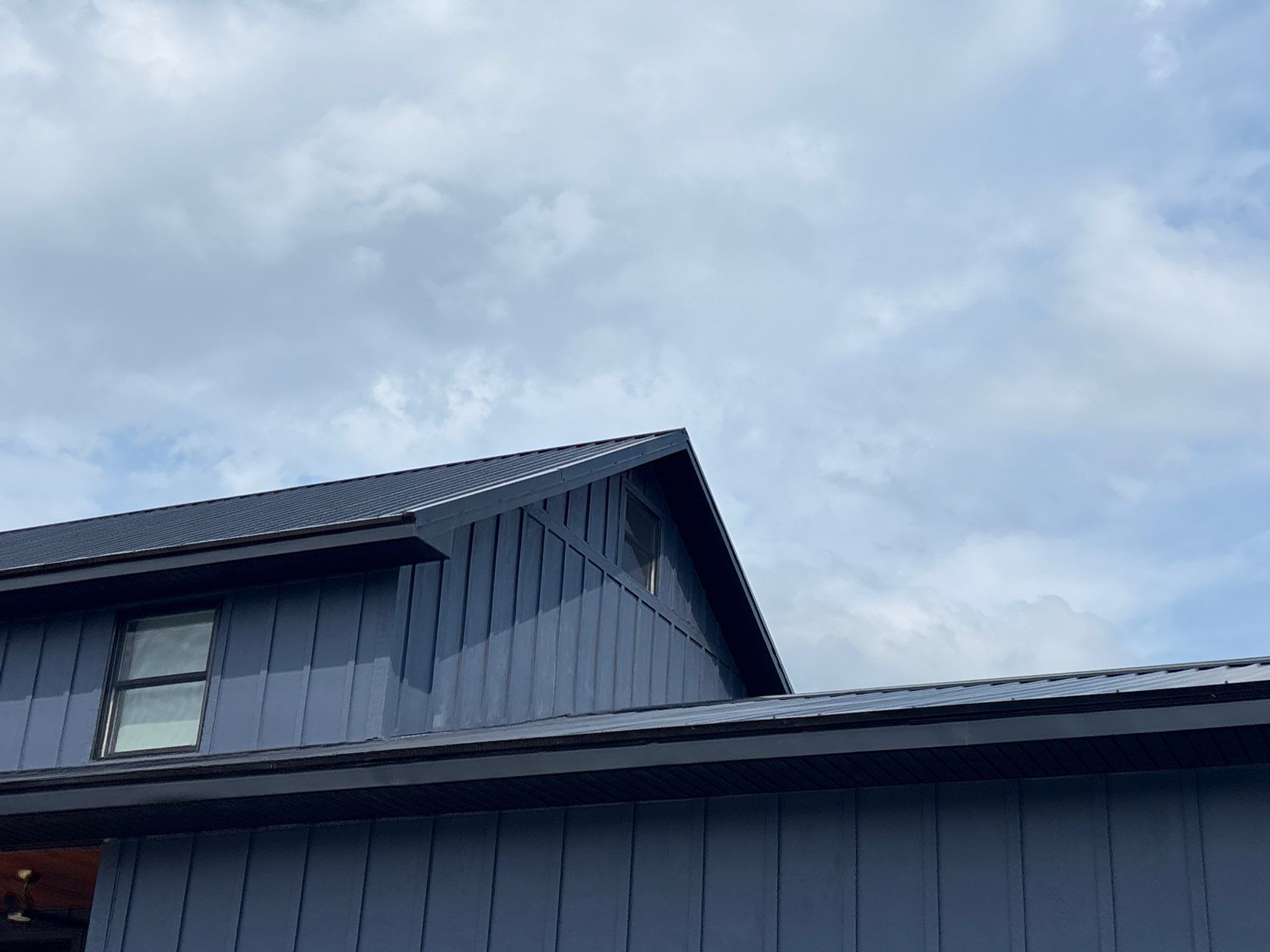 Siding and Metal Roof by Fahey Roofing + Contracting