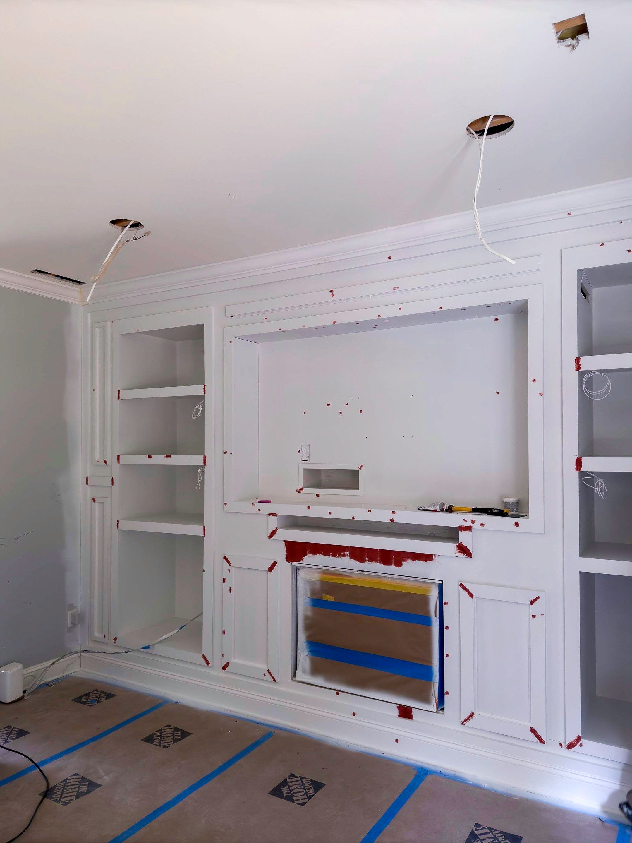 Built-in TV unit by Trendy Walls Inc.