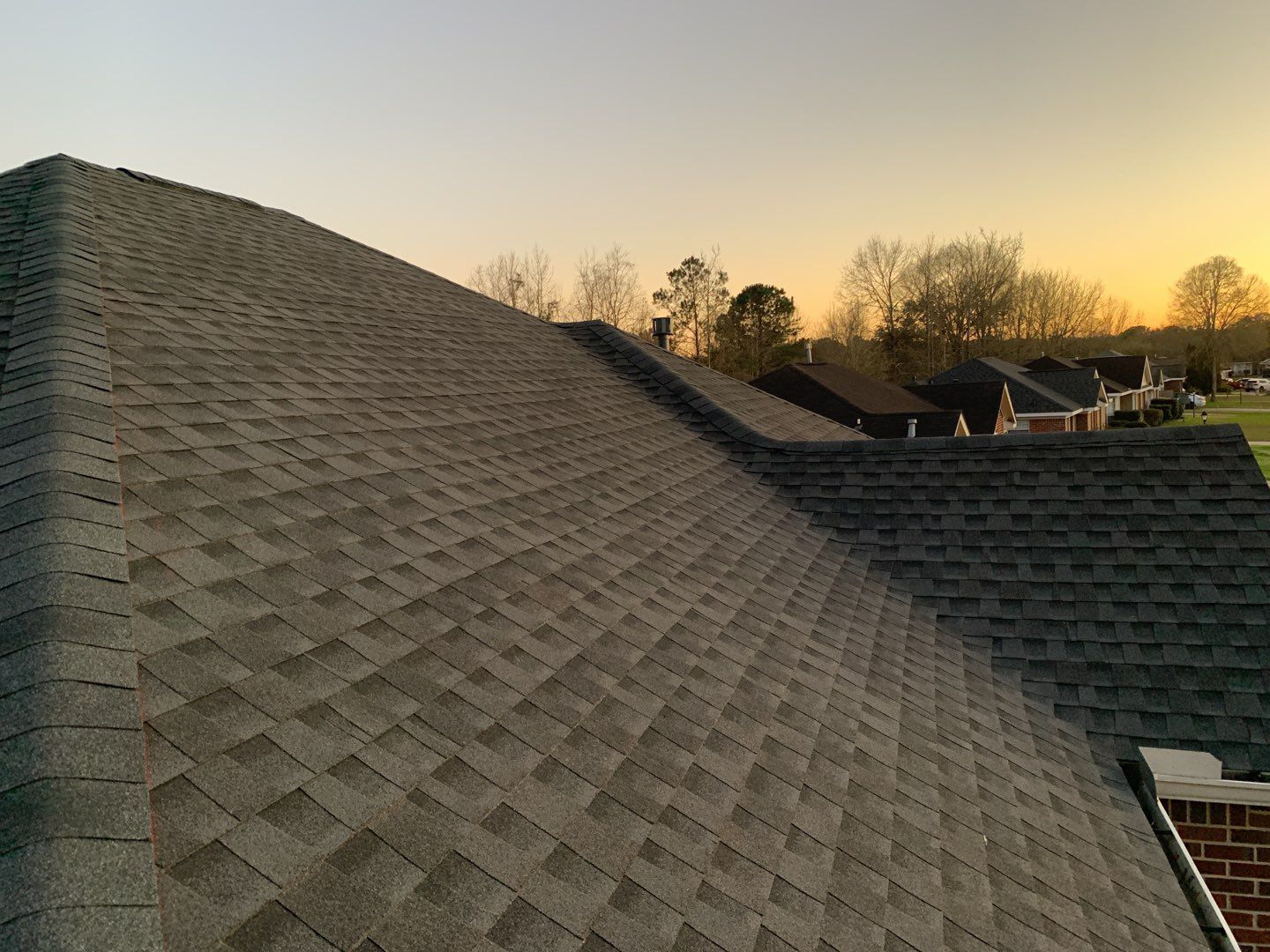 Residential Roofing Installation using Roof Replacement by American Roofing & Construction LLC