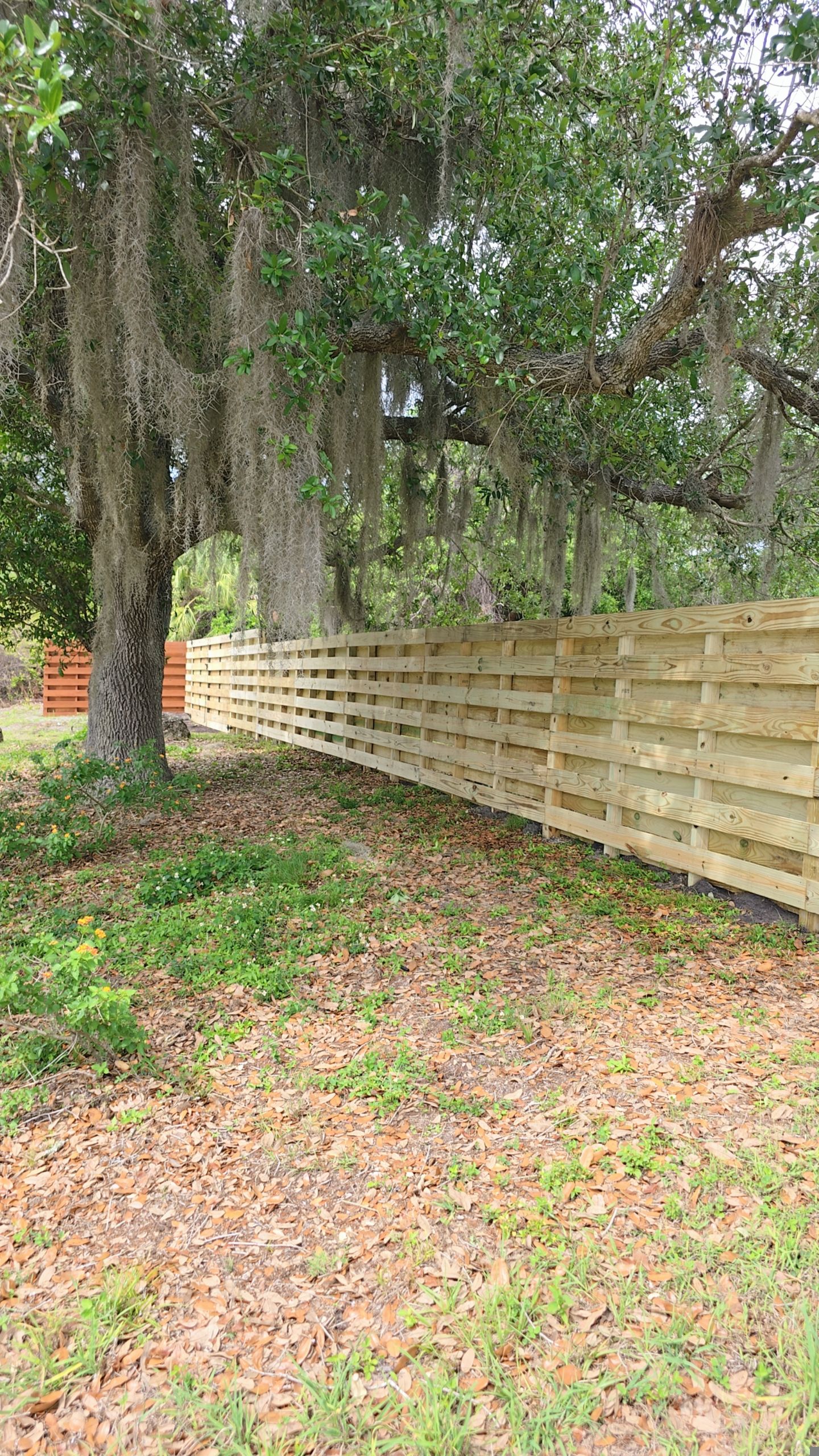 Horizontal Shadowbox Fence in Port Charlotte by True Fence LLC