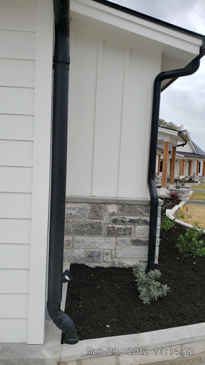 30K gallon mangrove green tank for residential rain water harvesting, Dripping Springs, TX by Hill Country Rain Water