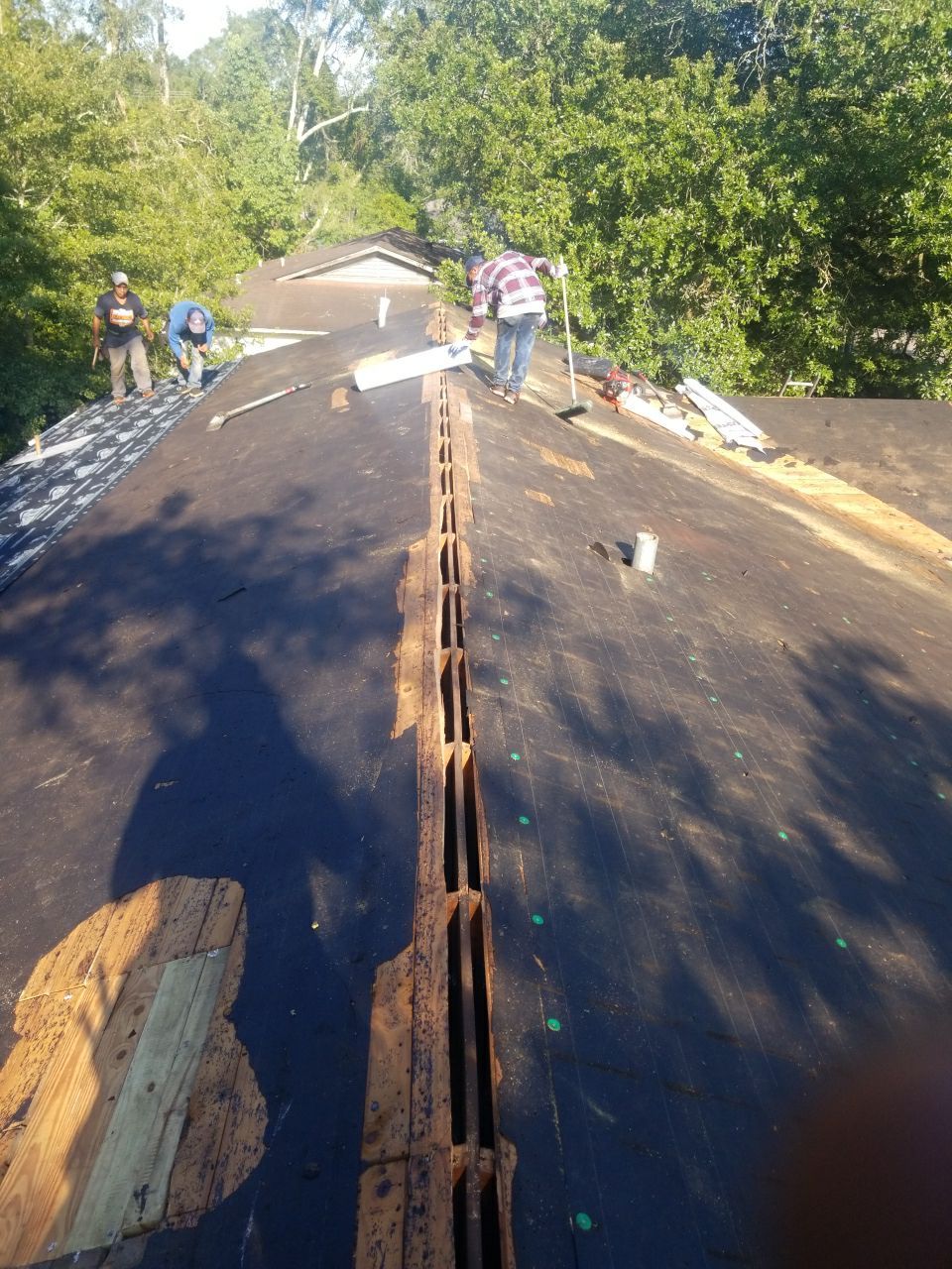 Residential Roofing Installation using Metal roofing by American Roofing & Construction LLC
