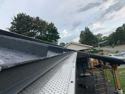 Residential Roofing Installation using 16" Standing Seam Panels by Jay Carter Roofing & Sheet Metal