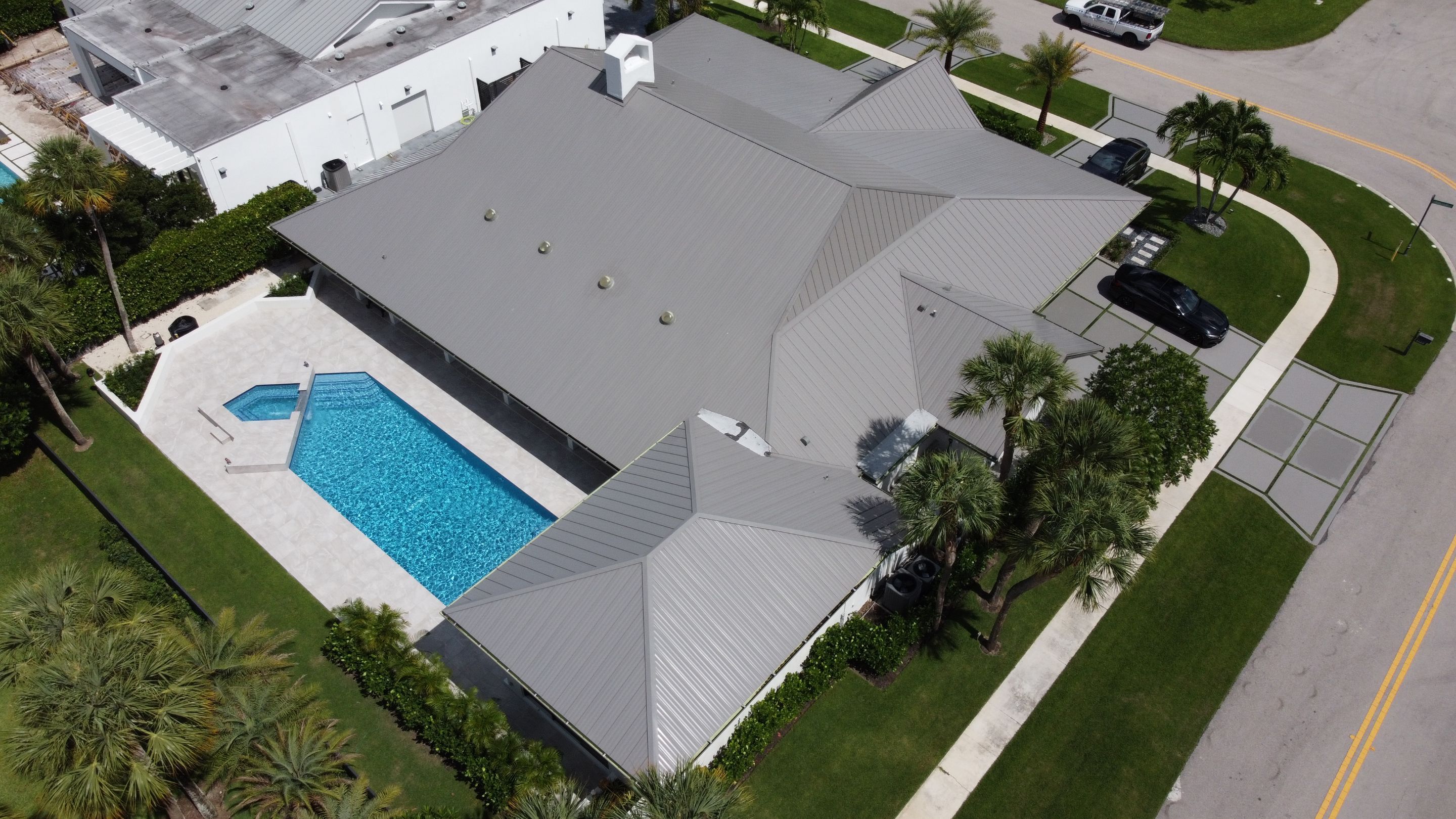Residential Roofing Installation using 1" Nail strip metal roof by BLUES BROTHERS CONSTRUCTION CORP