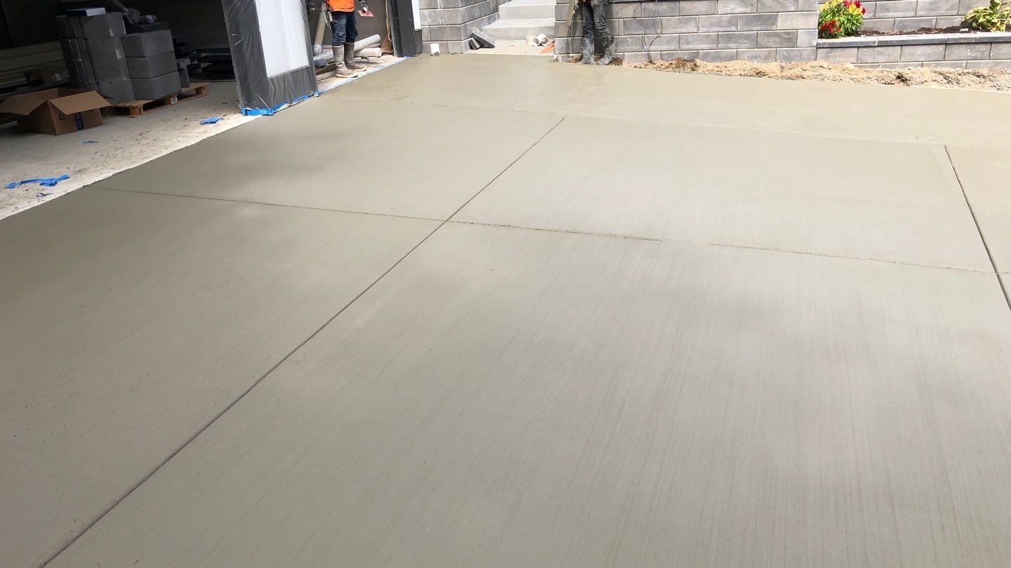 Bruce | Broom Finish Driveway, Concrete Project by Jireh Asphalt & Concrete Inc 