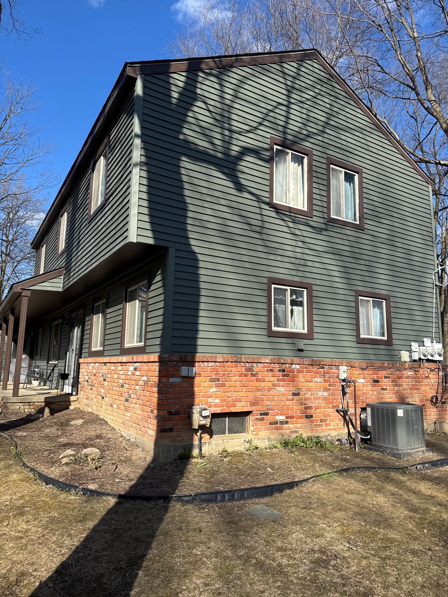 Siding Replacement using Alside Charter Oak D4.5" Deep Moss by 180 Contractors