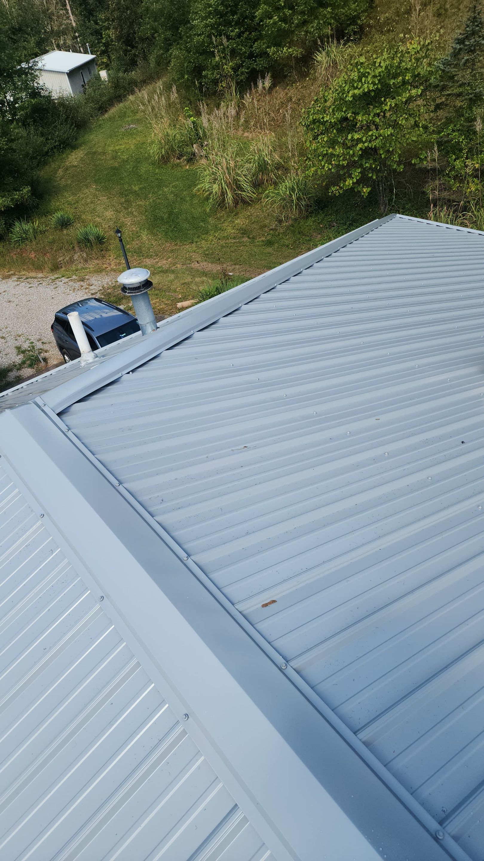 Residential Roofing Installation using Metal by Rainstoppers Roofing