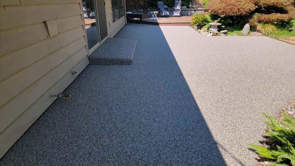 Monticello Sanctuary: A Patio of Refined Tranquility by Concrete Coating Experts Inc.