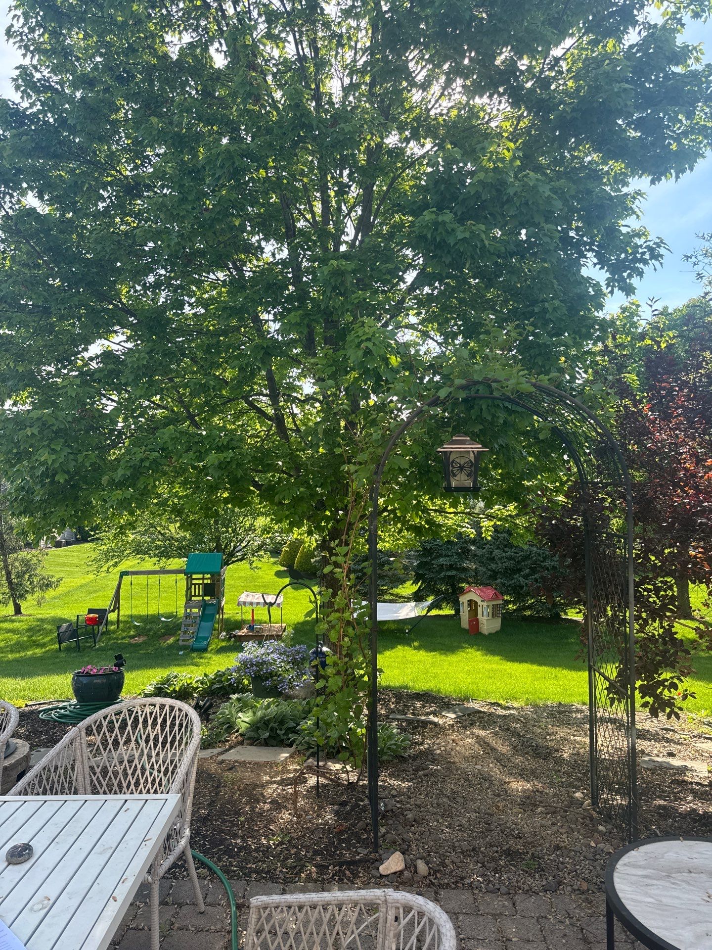 Backyard Retreat: Techo-Bloc Patio + Firepit Lounge by Saylor’s Lawn & Landscape