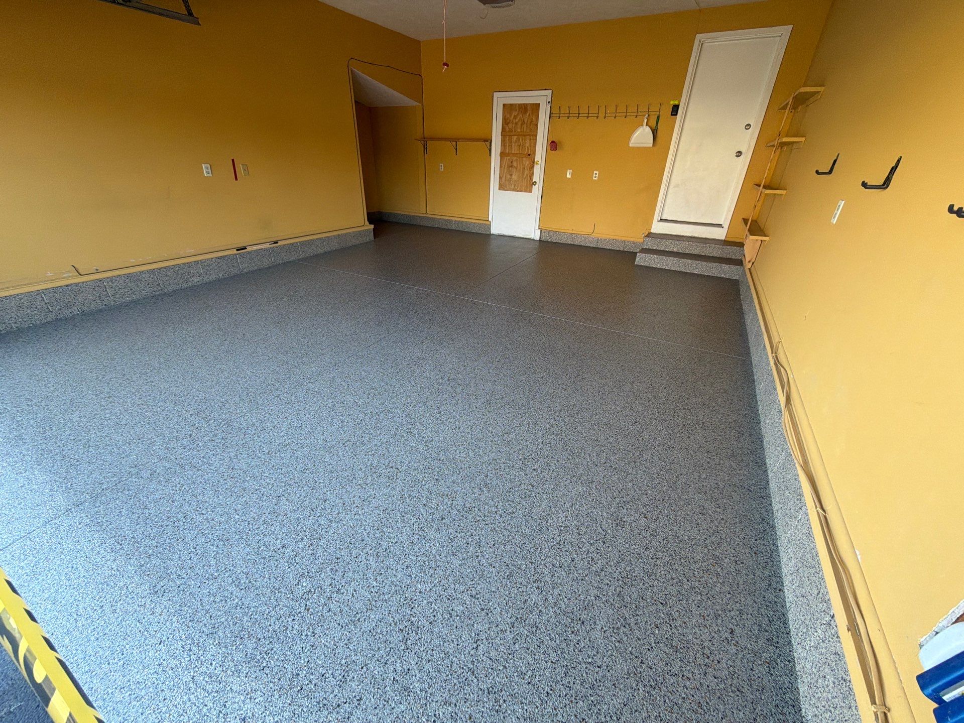 Vintage Goldmine Garage Coating by NG Masonry & Construction LLC