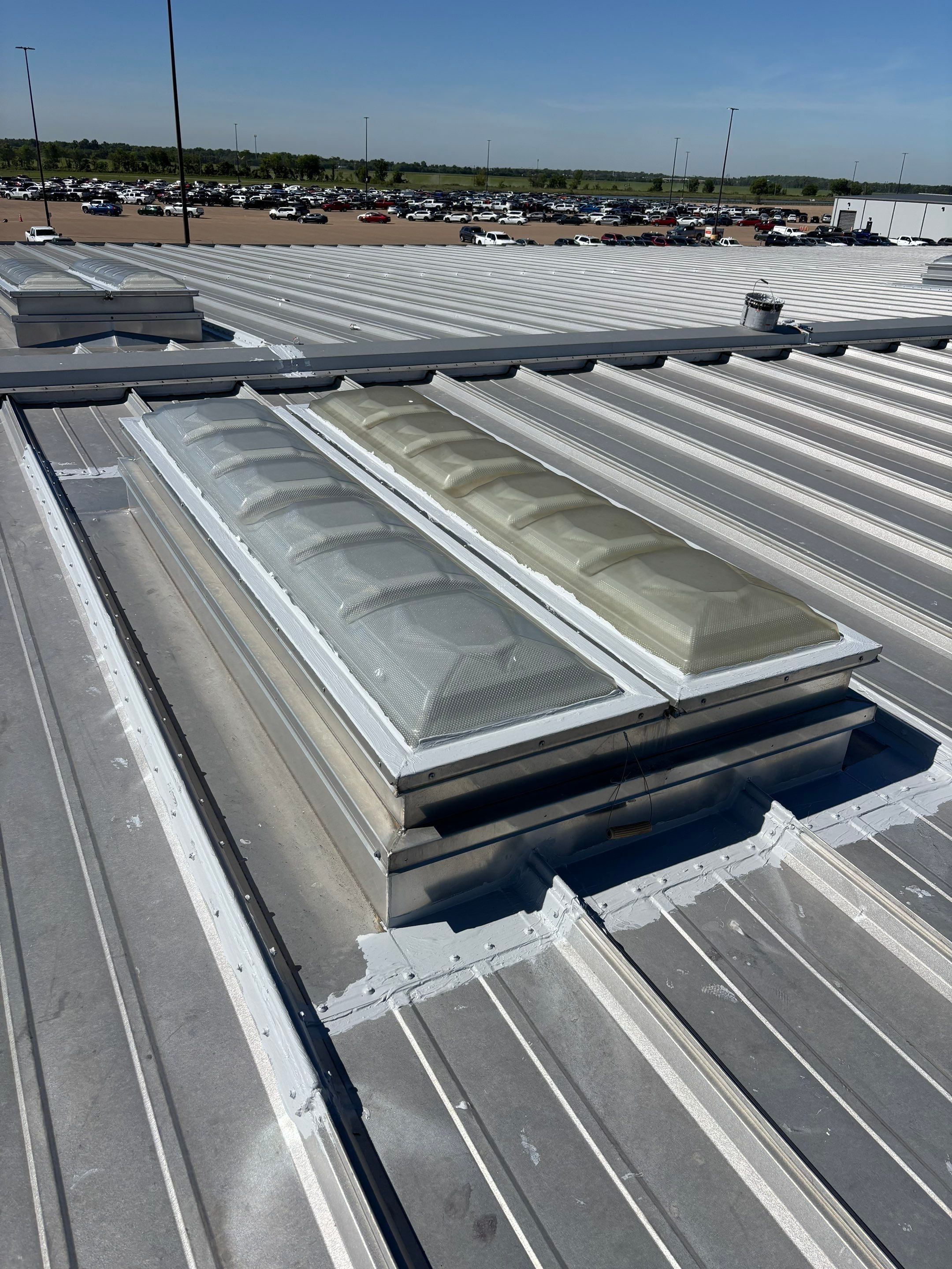 Commercial Metal Roof Repair and Skylight Sealing in West Memphis by Revival Roofing Services
