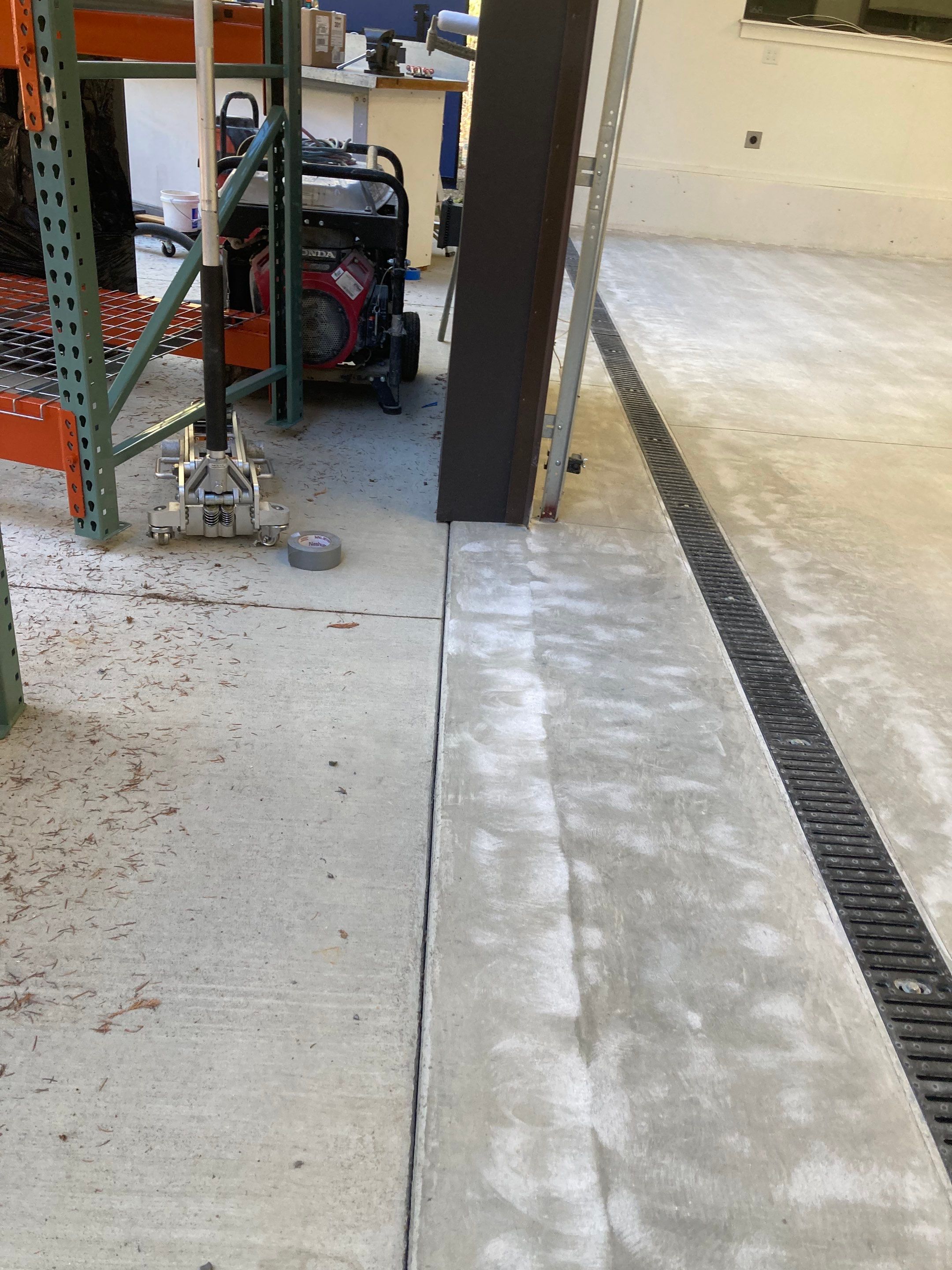 Garage Transformation using Domino and the Penntek Evolution System by Croc Coatings, LLC