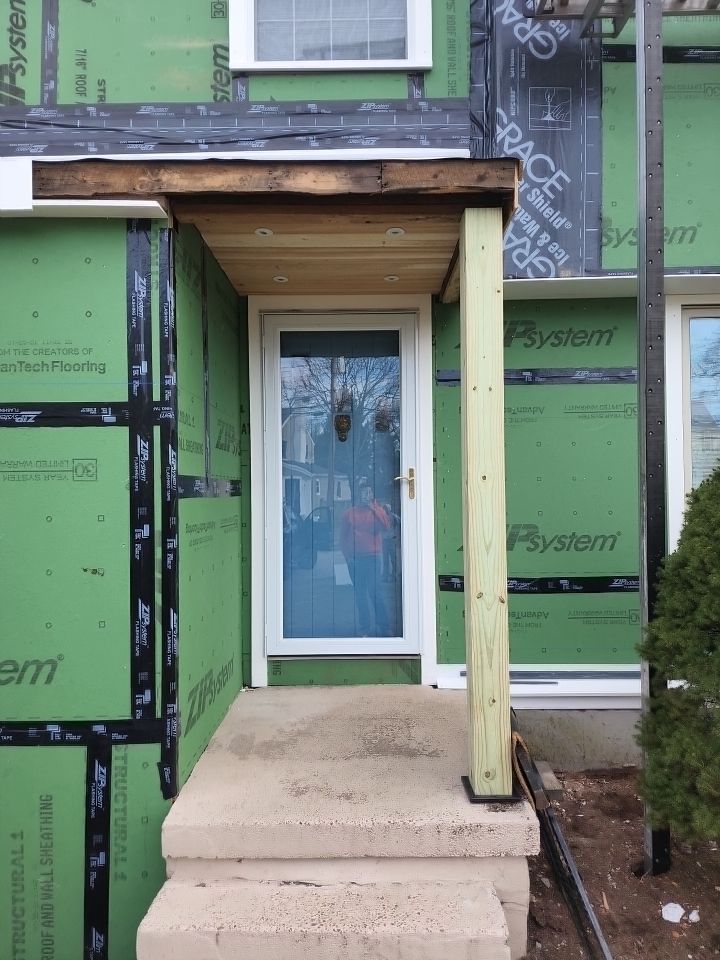 James Hardie siding, new metal roof and couple windows being installed. by UBrothers Construction