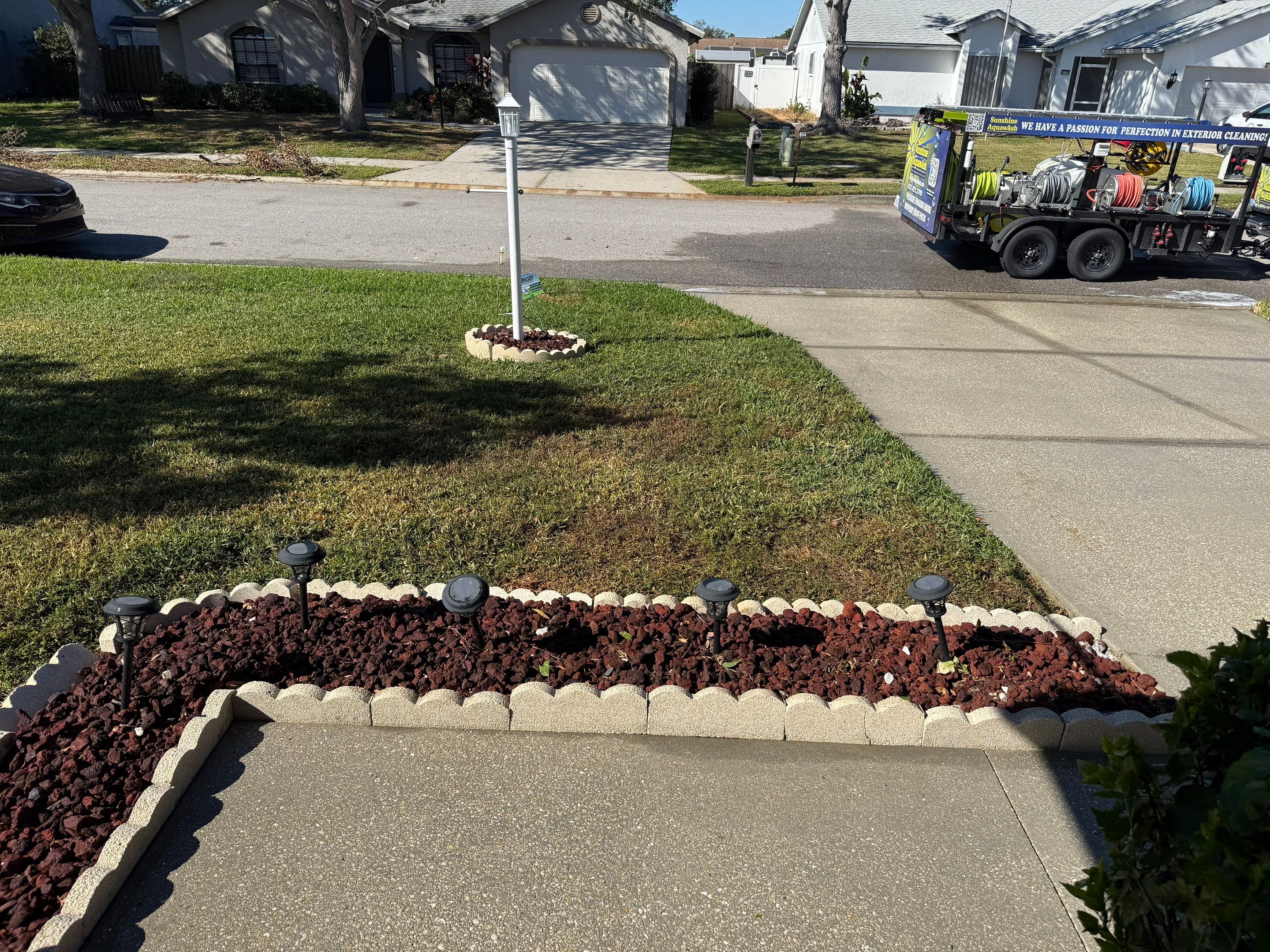 Concrete Driveway, Decorative Flowerbed Curbing & Front House Wash in Heather Glen, Palmetto, FL | Sunshine AquaWash by Sunshine AquaWash