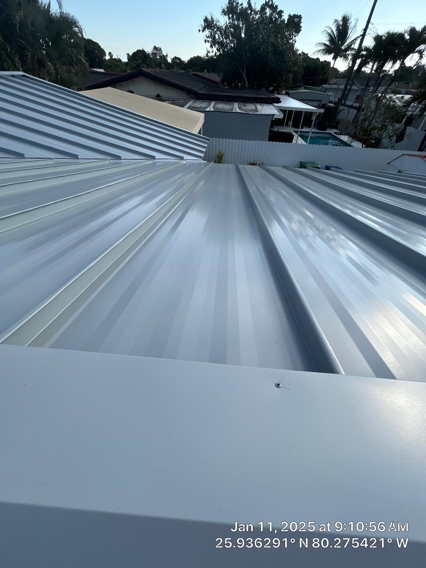 RESIDENTAL METAL REROOF 24 GUAGE DOVE GRAY 1-1/2" MECHANICAL SEAM METAL POLYGLASS POLYSTICK XFR by Earl W. Johnston Roofing 