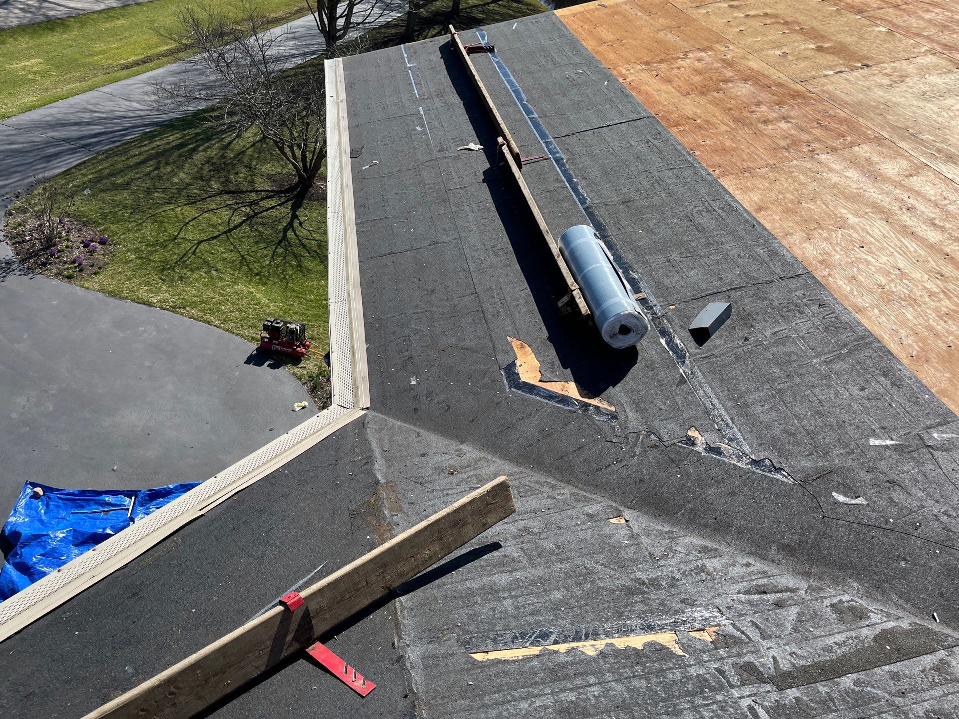 Asphalt Roof Replacement by Custom Installations