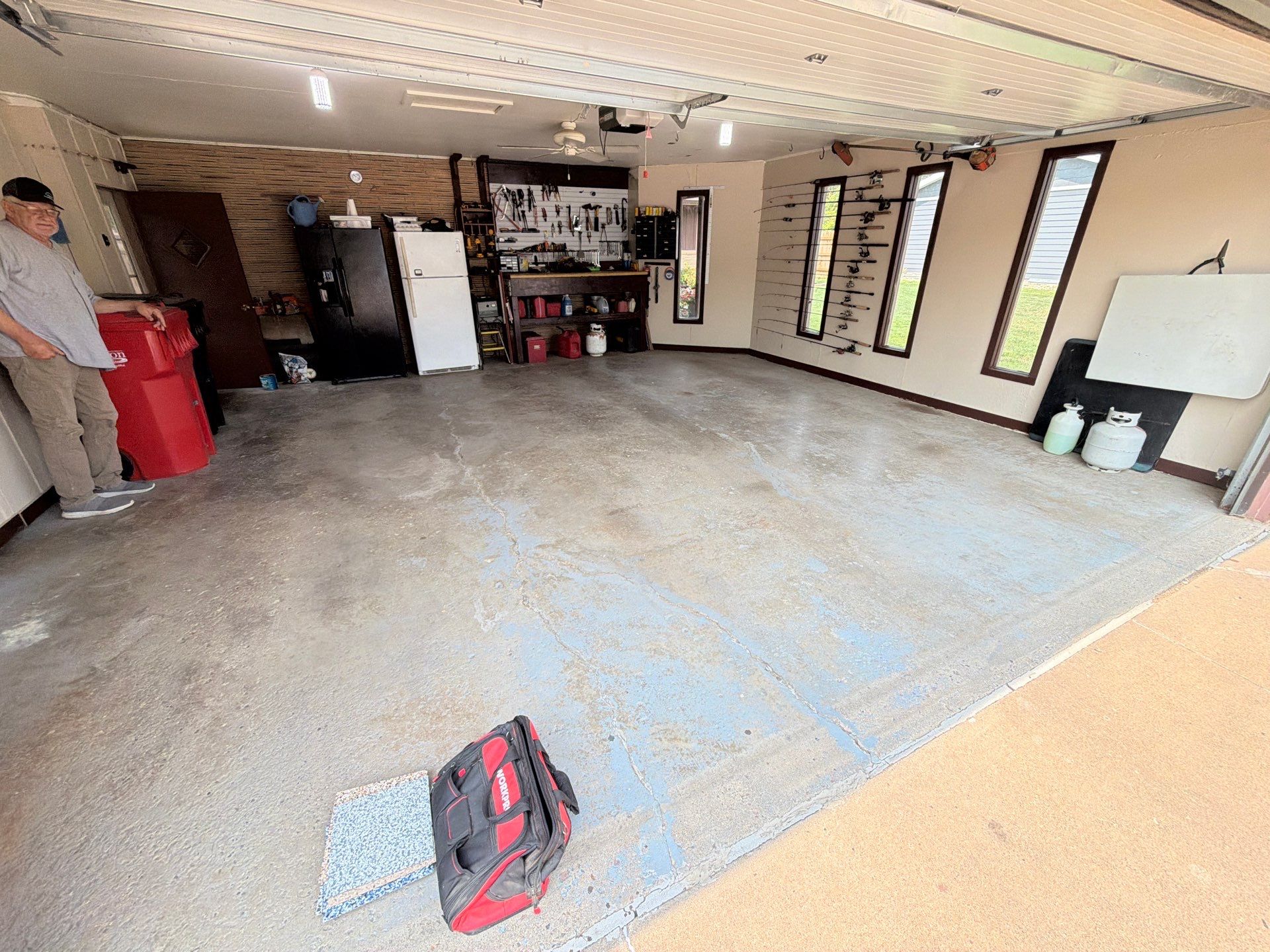 Garage Floor Coating with Crack Repair in Yankton by Select Painting, Coatings & Garage Cabinets