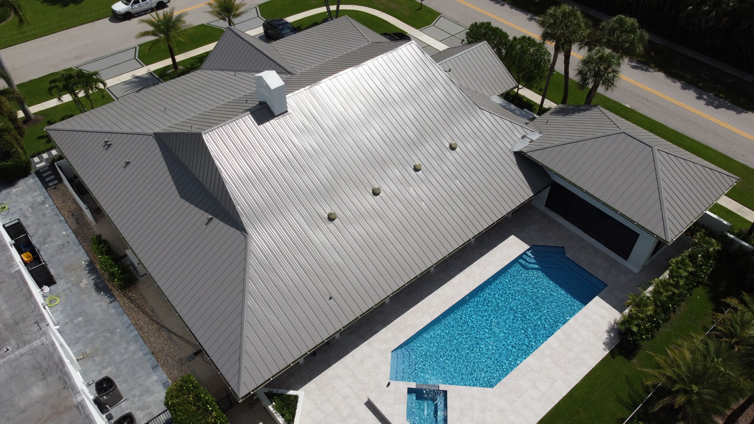 Residential Roofing Installation using 1" Nail strip metal roof by BLUES BROTHERS CONSTRUCTION CORP