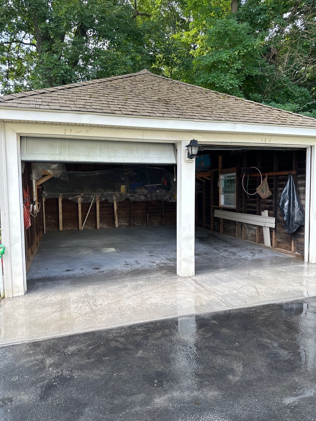 Concrete garage floor replacement with a broom finished apron by NG Masonry & Construction LLC