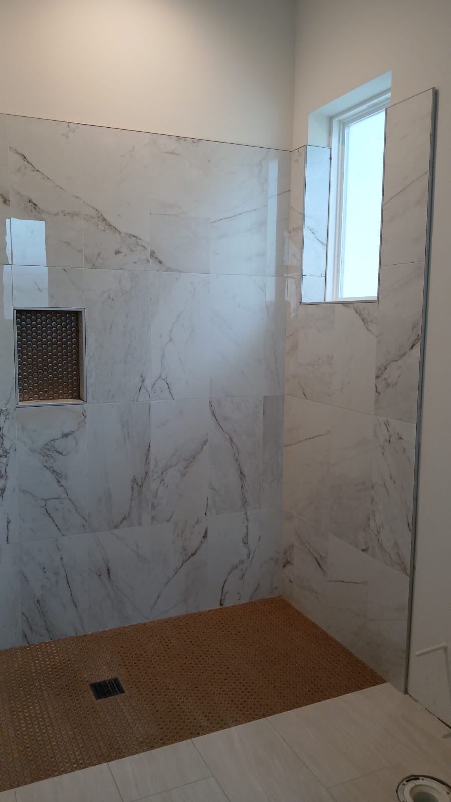 Kitchen and Bathroom Remodel Featuring Custom Stone and Tile in Mico by Mena stone surfaces