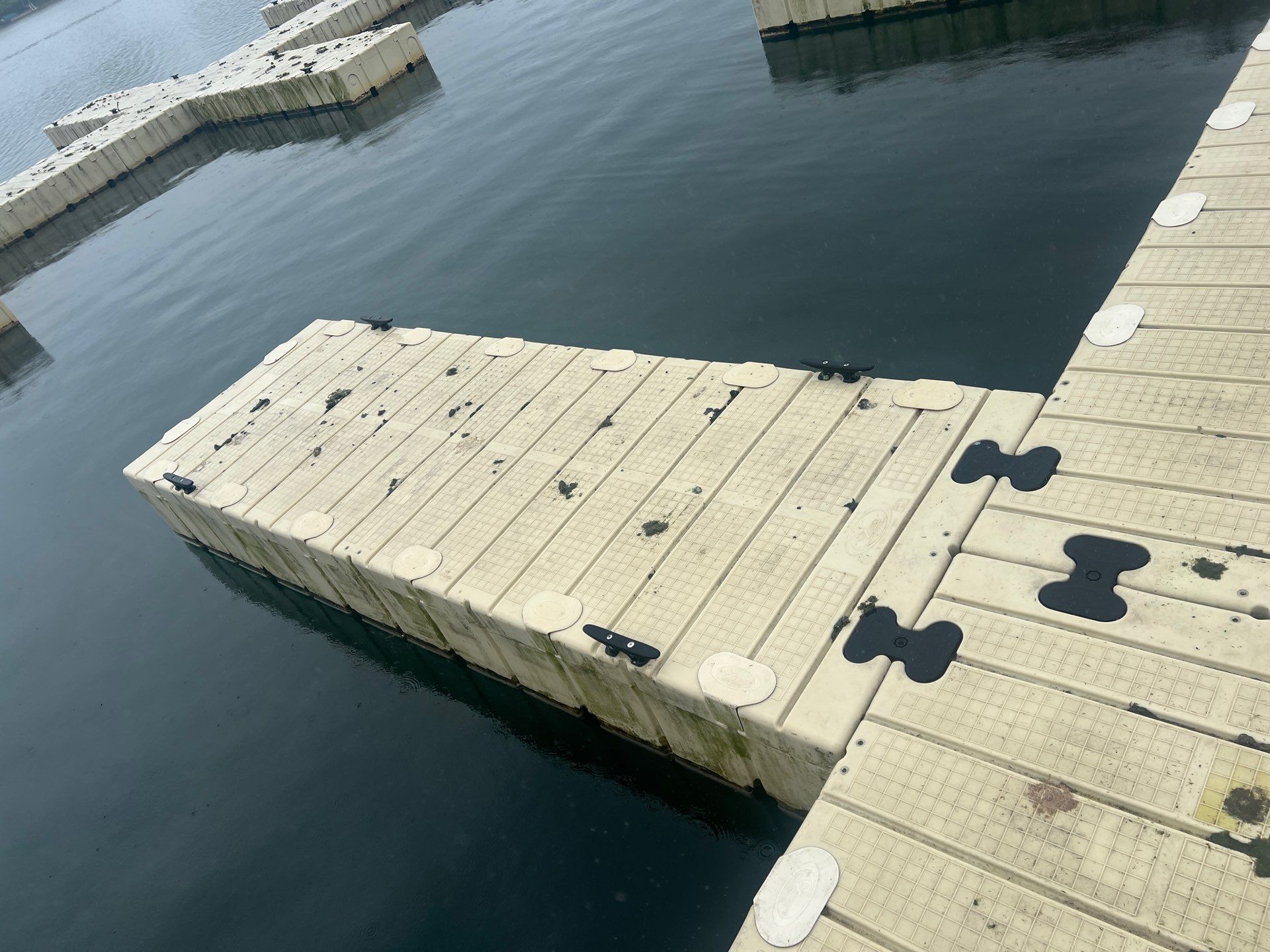 Power washing of floating dock by Northern Power Washing LLC.