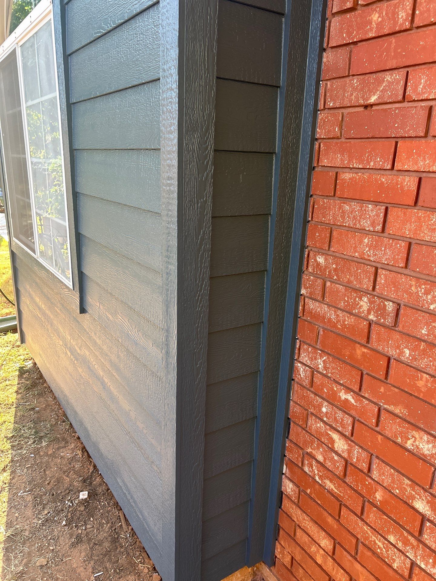 Siding Replacement and Exterior Painting in Edmond, OK by McCann's Roofing and Construction