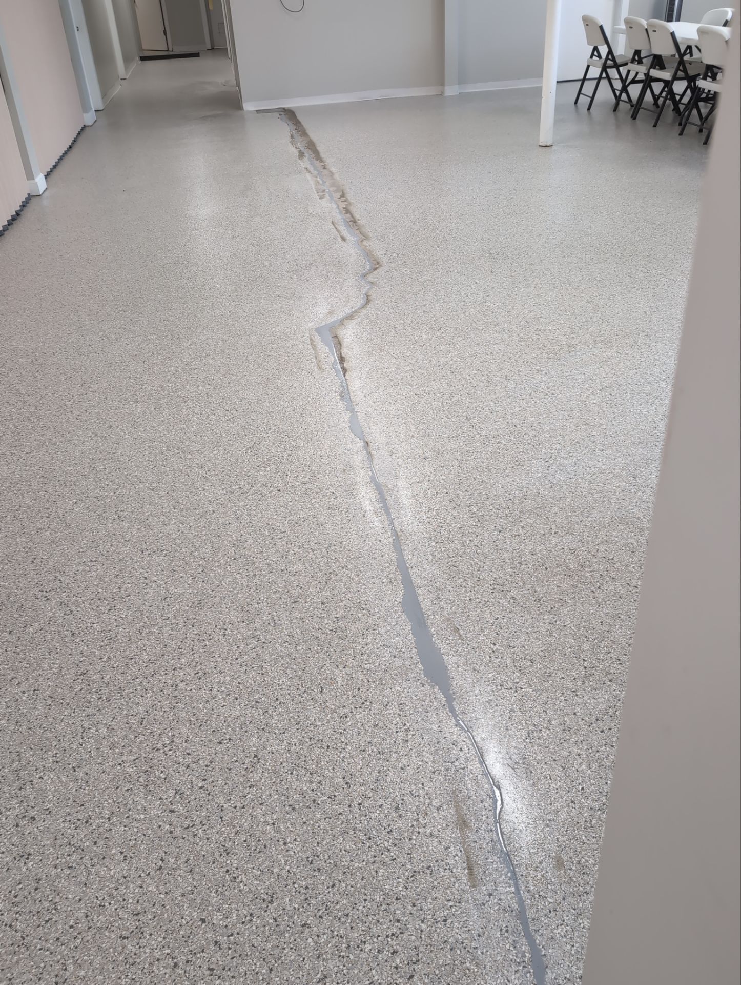 Medina Cracked basement floor with Epoxy by Beck Restoration Management Group