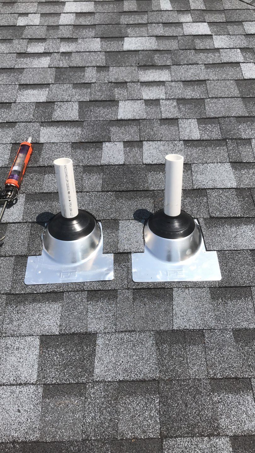 Commercial Roofing Installation using EPDM with white gutters by A Plus Exterior