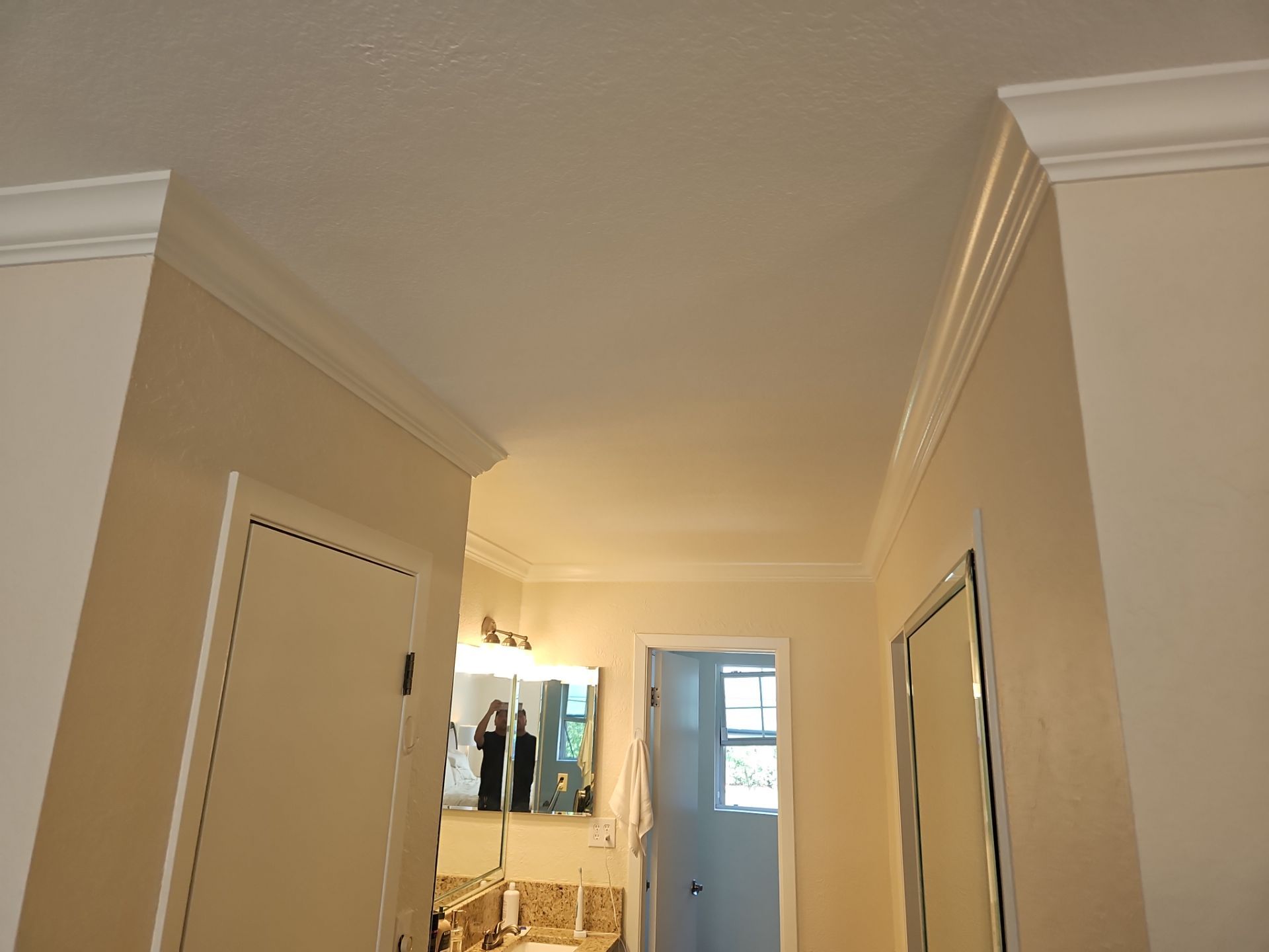 Garage Floor Coating and Crown Moulding Install  by Regal Renovate