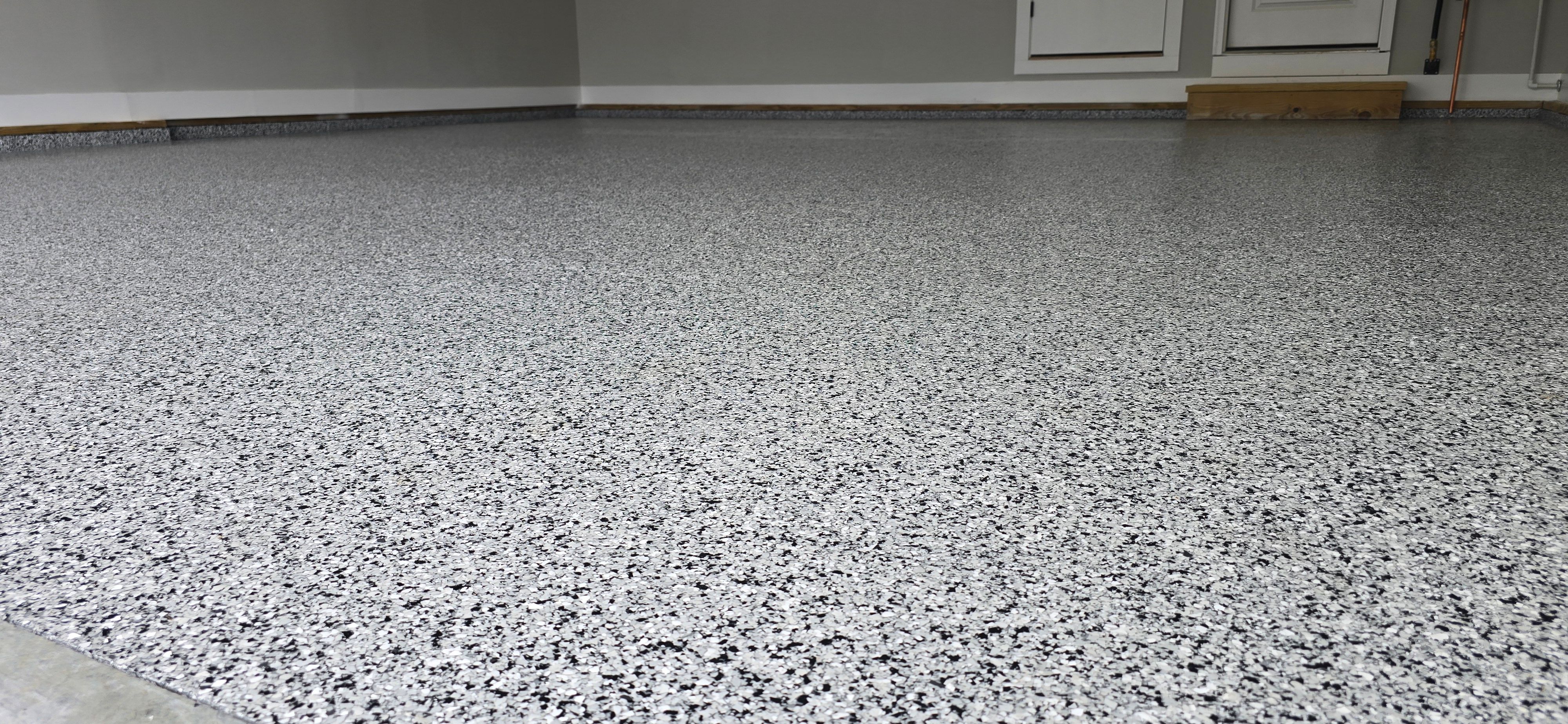 Garage using Houndstooth by Elite Floor Solutions