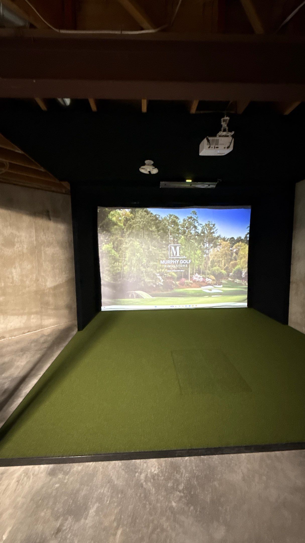 Rex Went With A Custom Golf Simulator  by Banner Garage