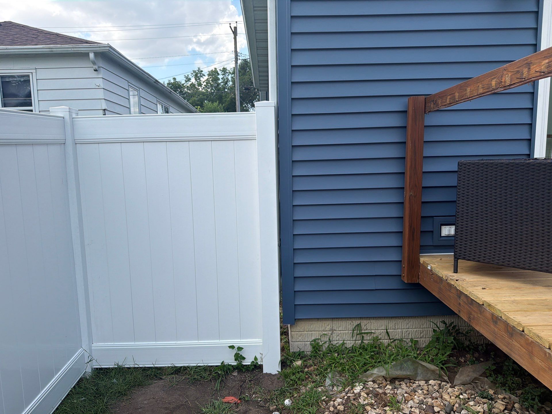 White Vinyl Privacy Fence Installation in Waterloo, Iowa by Perfect Picket Fence and Stain