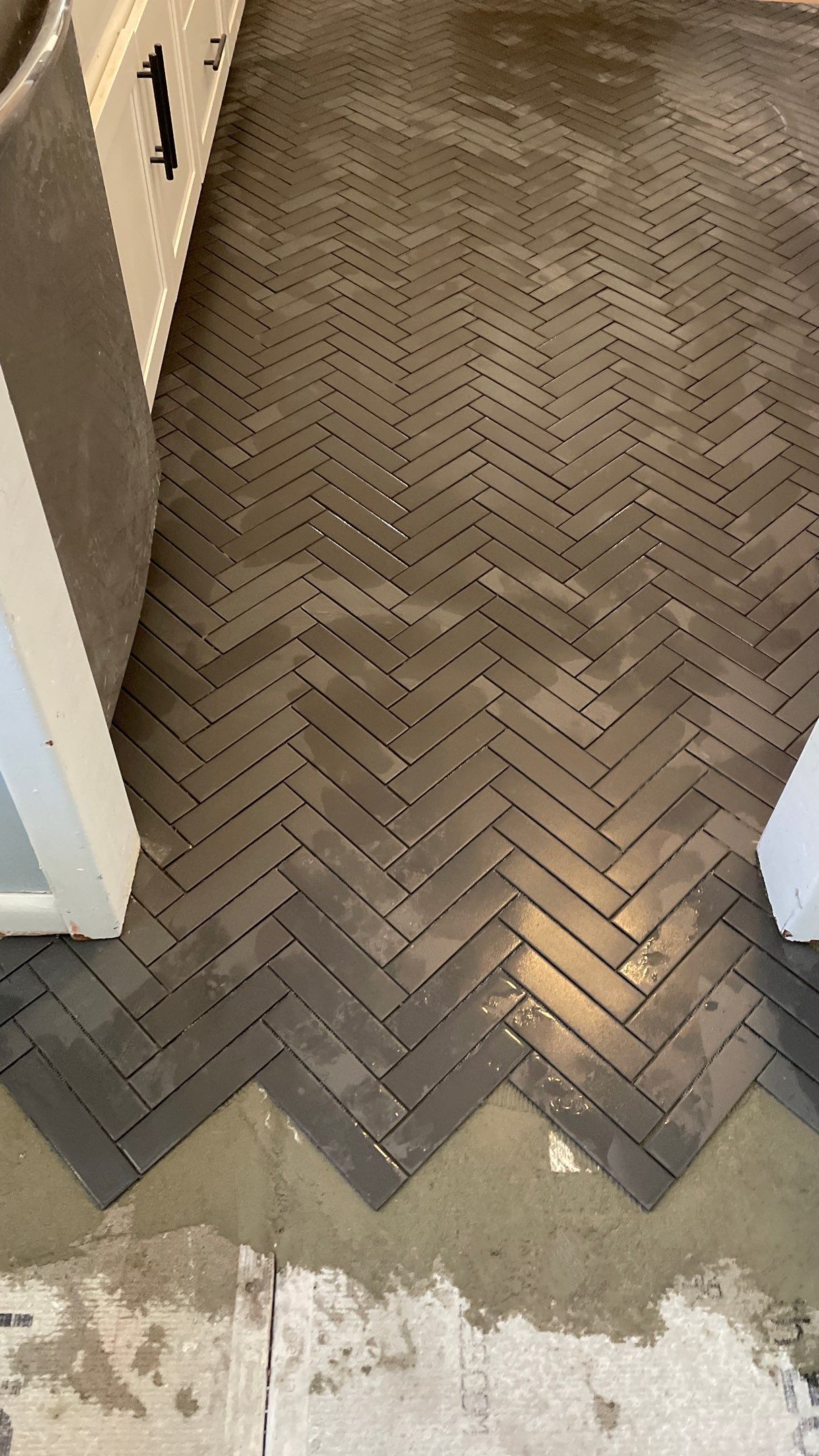 Kitchen Backsplash and Herringbone Tile Floor Remodel by Footprints Floors of Coastal Carolina