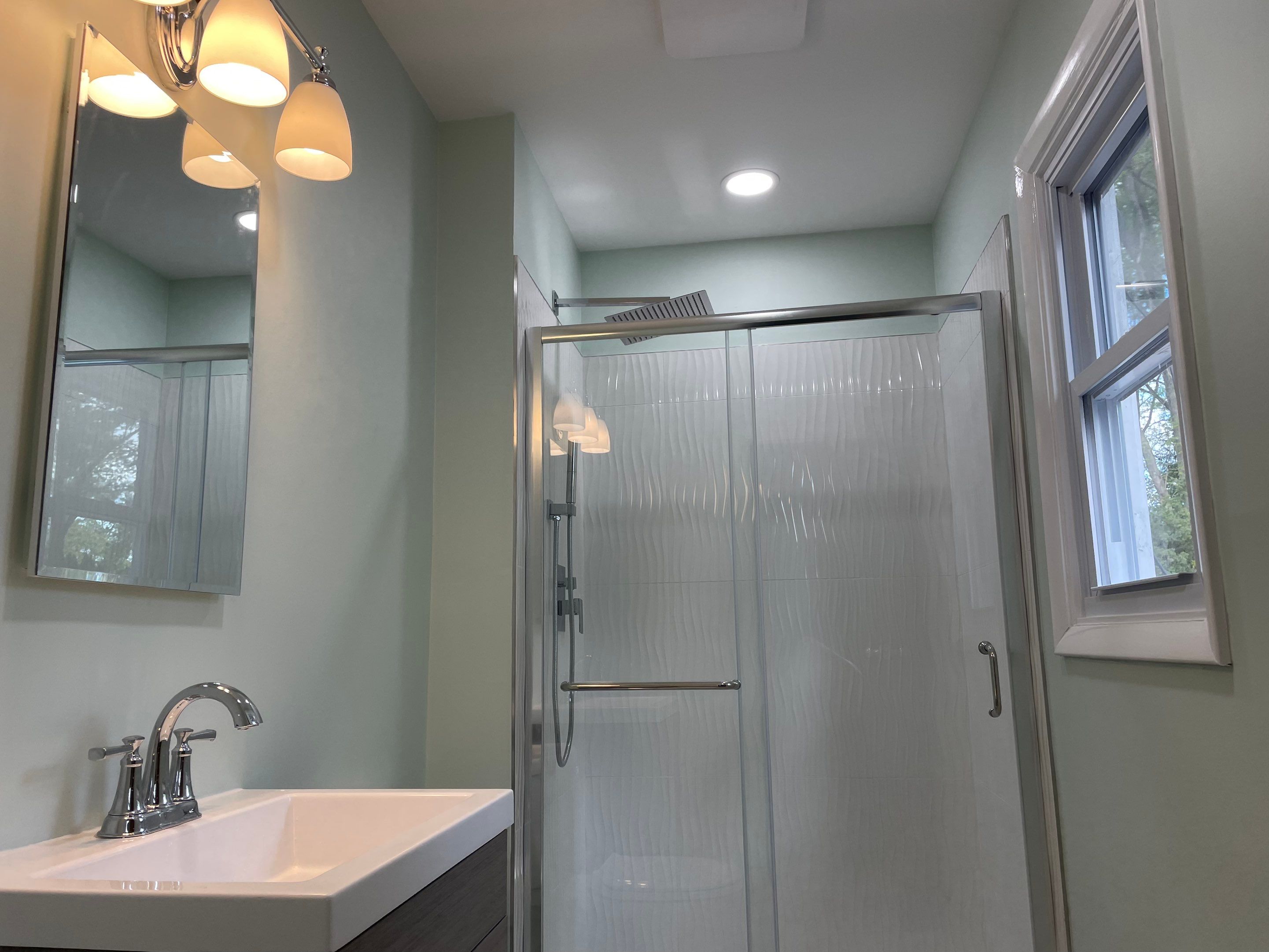 Bathroom Remodel using Tile by Home Concepts Construction